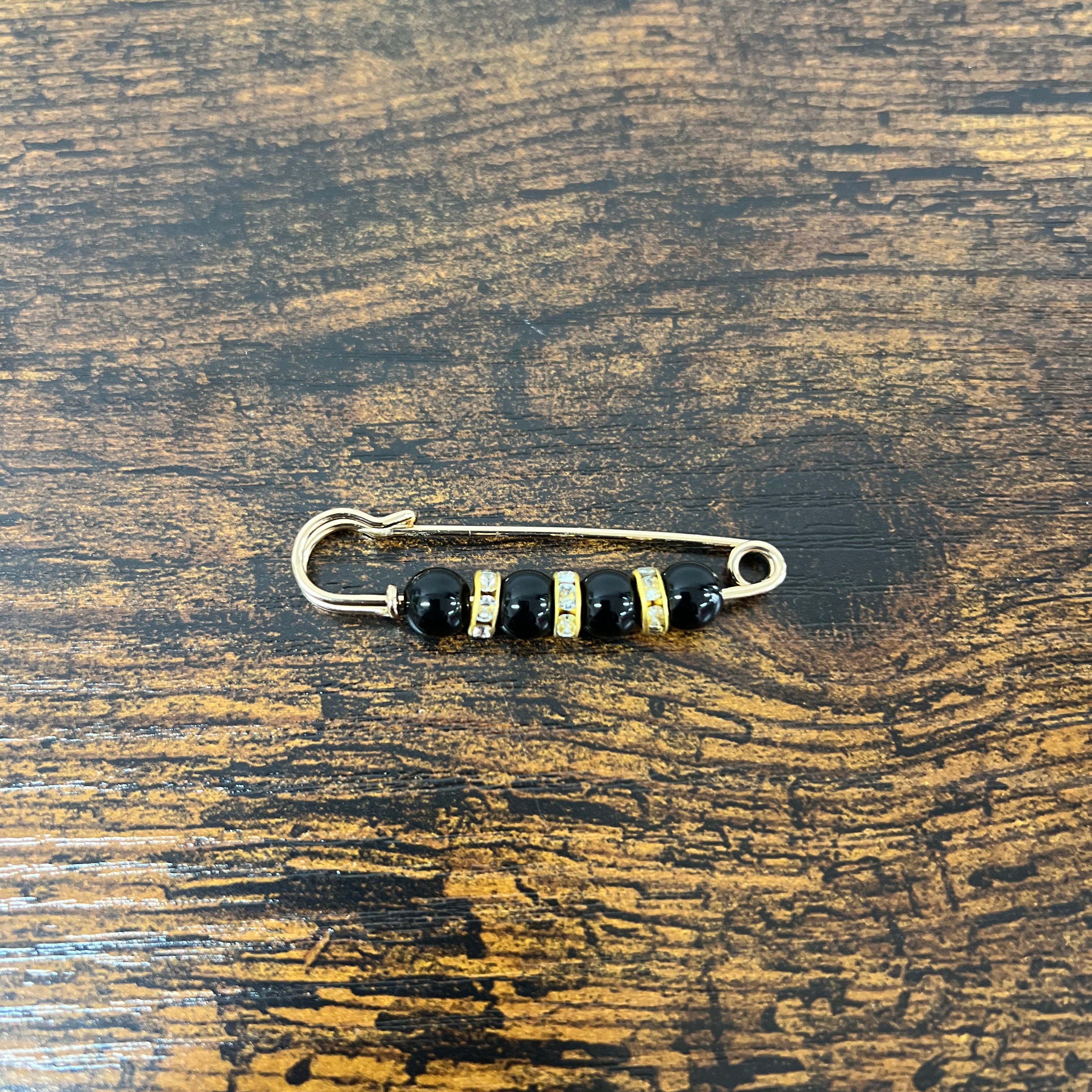 Spilla balia perle nere