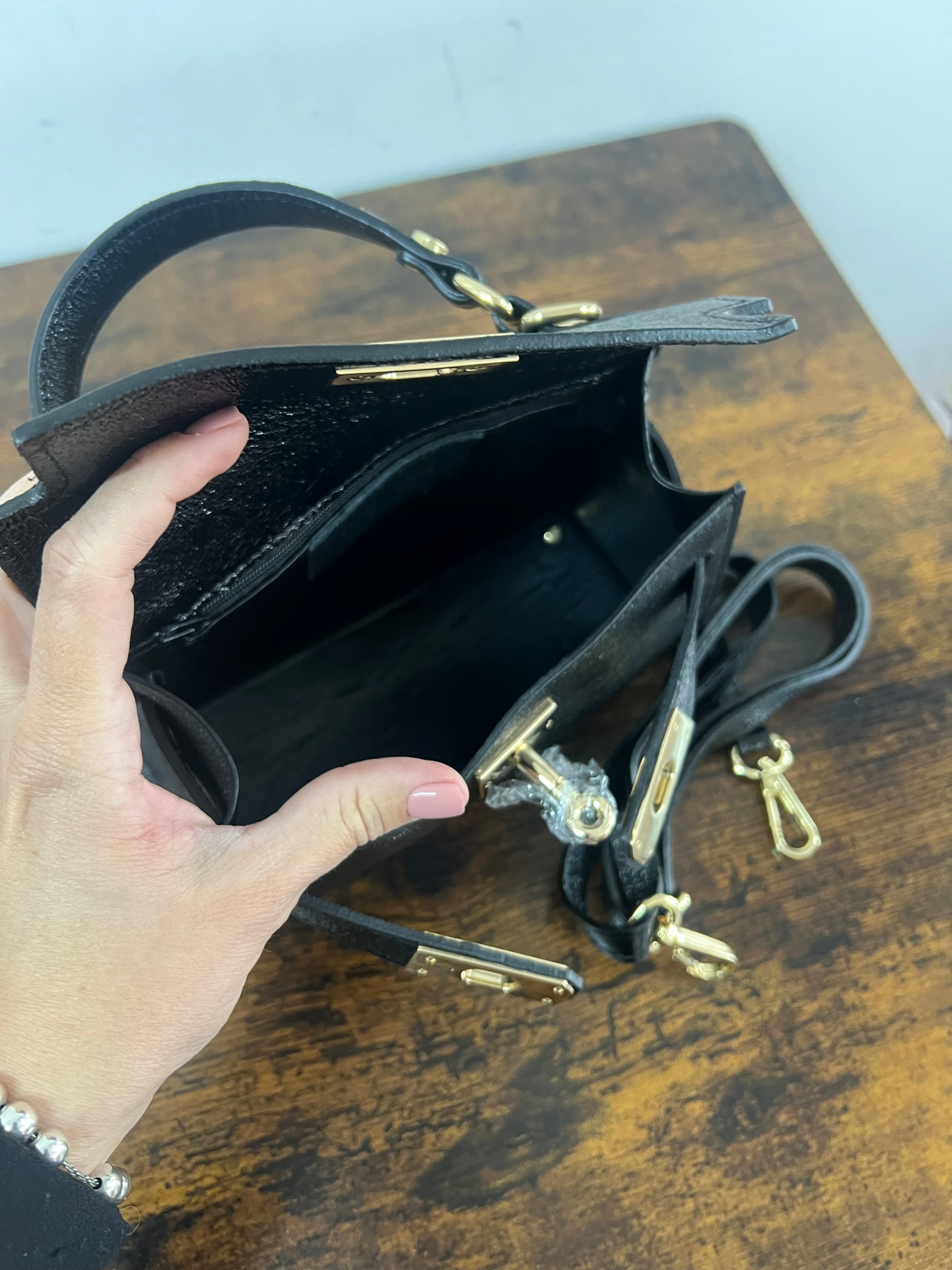 Kellie pocket nero laminato