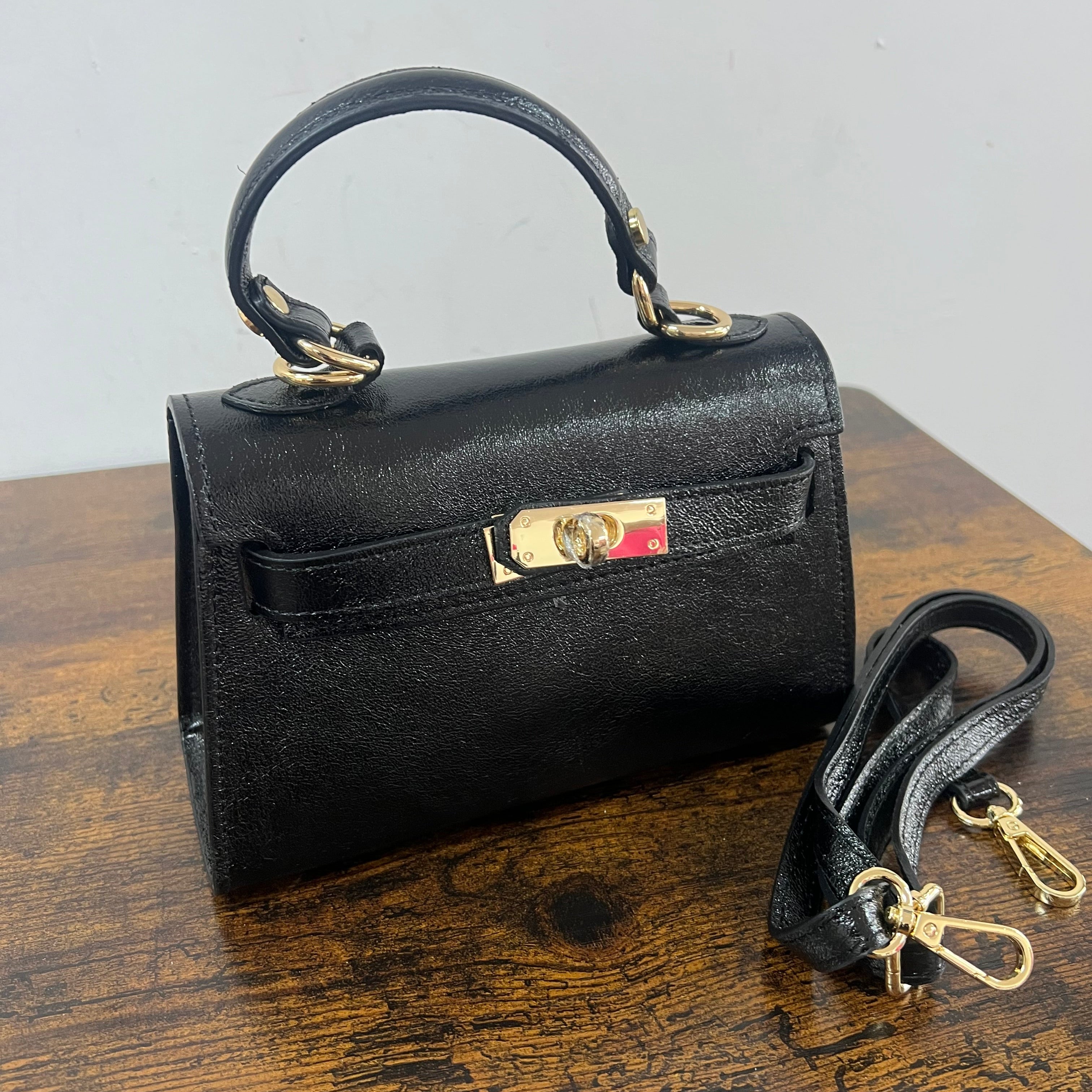 Kellie pocket nero laminato