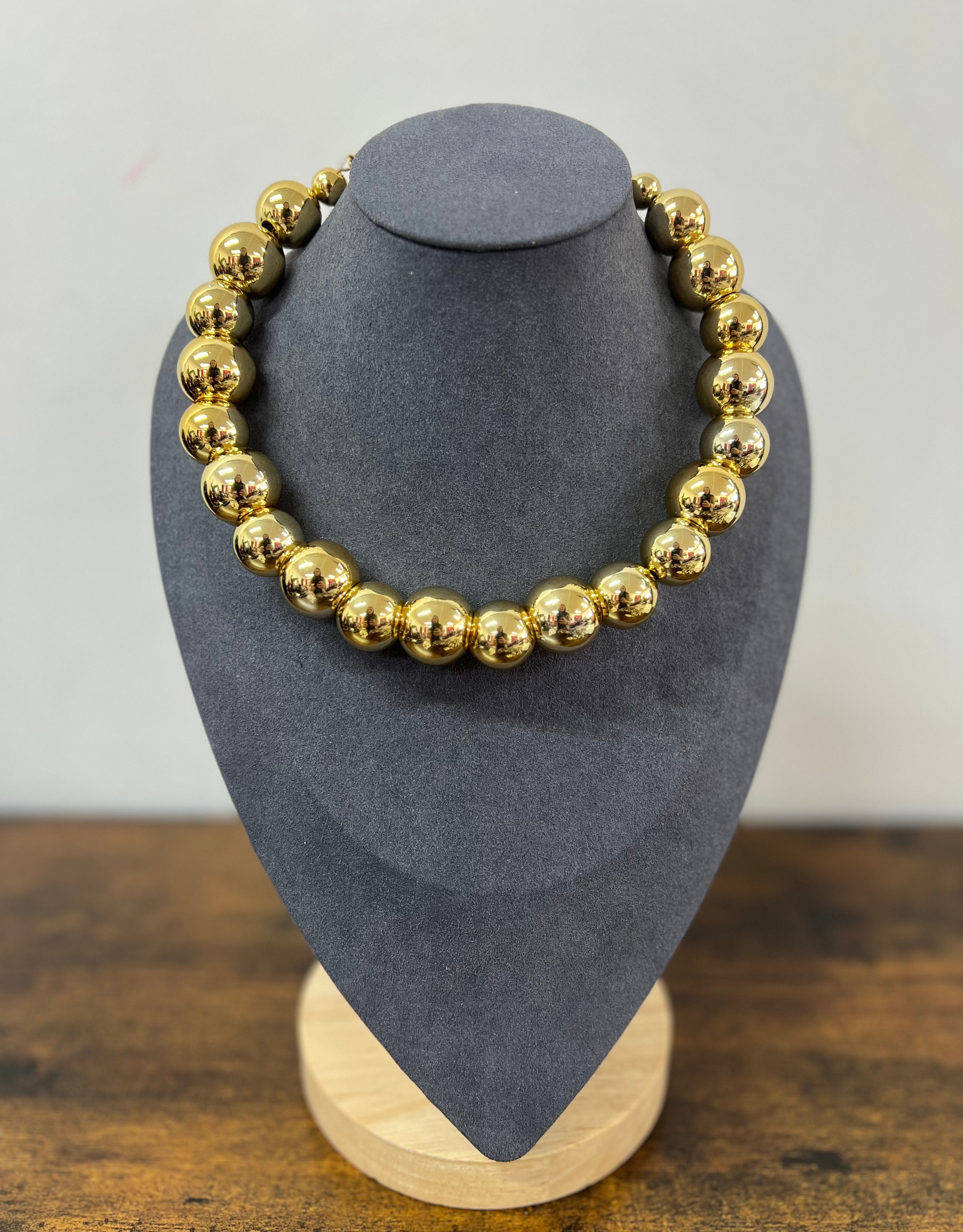Anew choker rigido sfere oro
