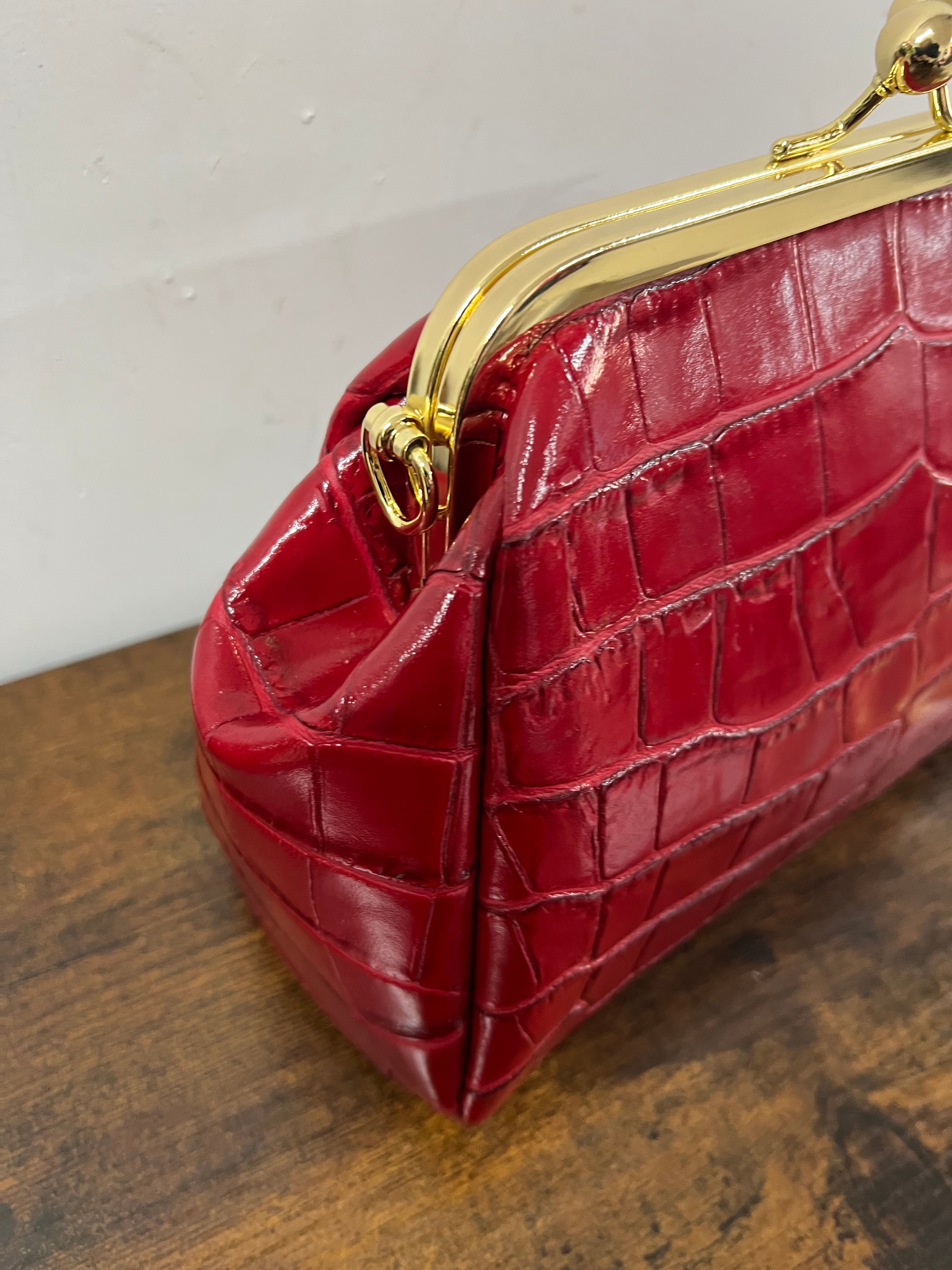 Large red patent crocodile print pouch