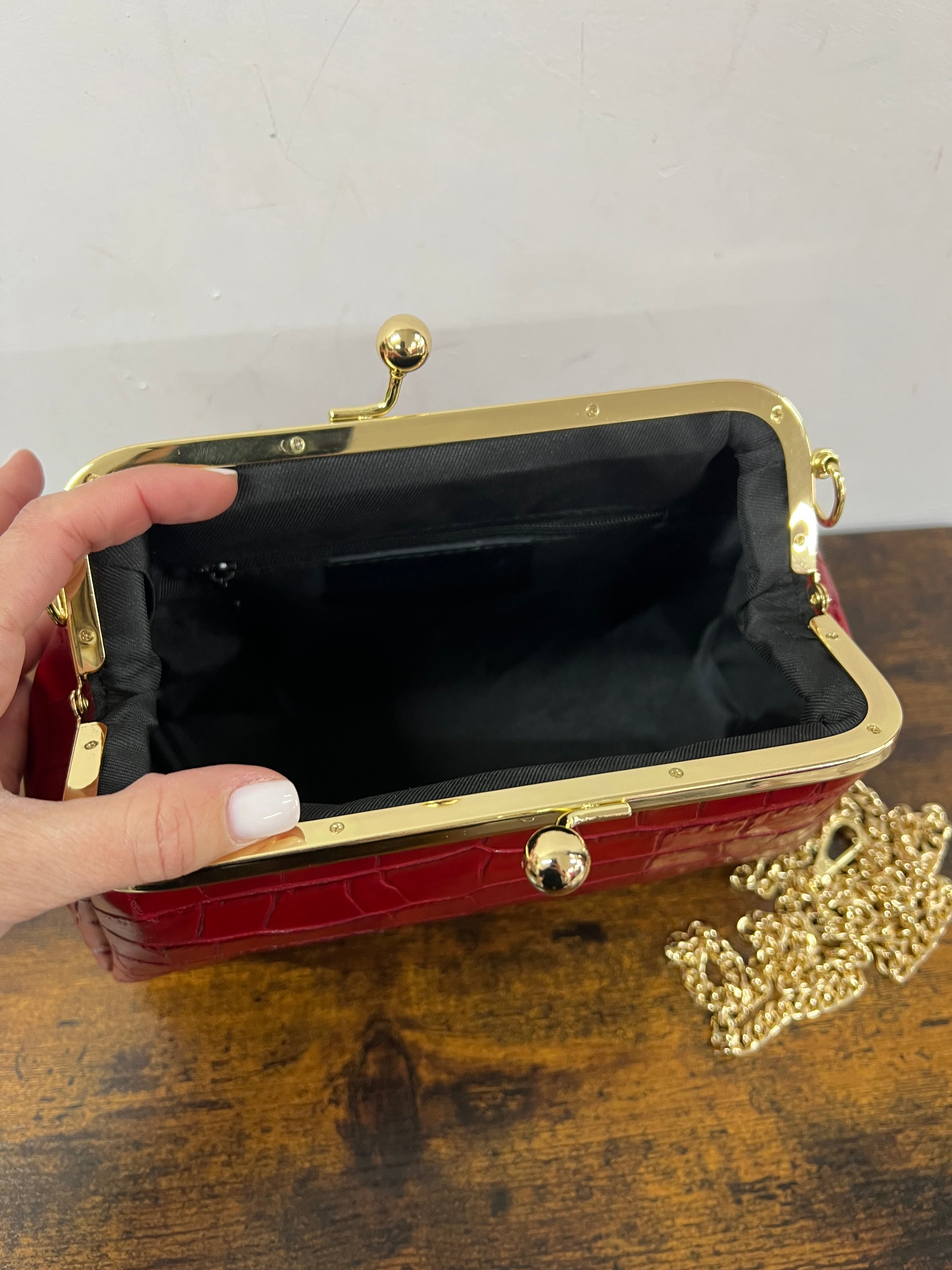 Large red patent crocodile print pouch