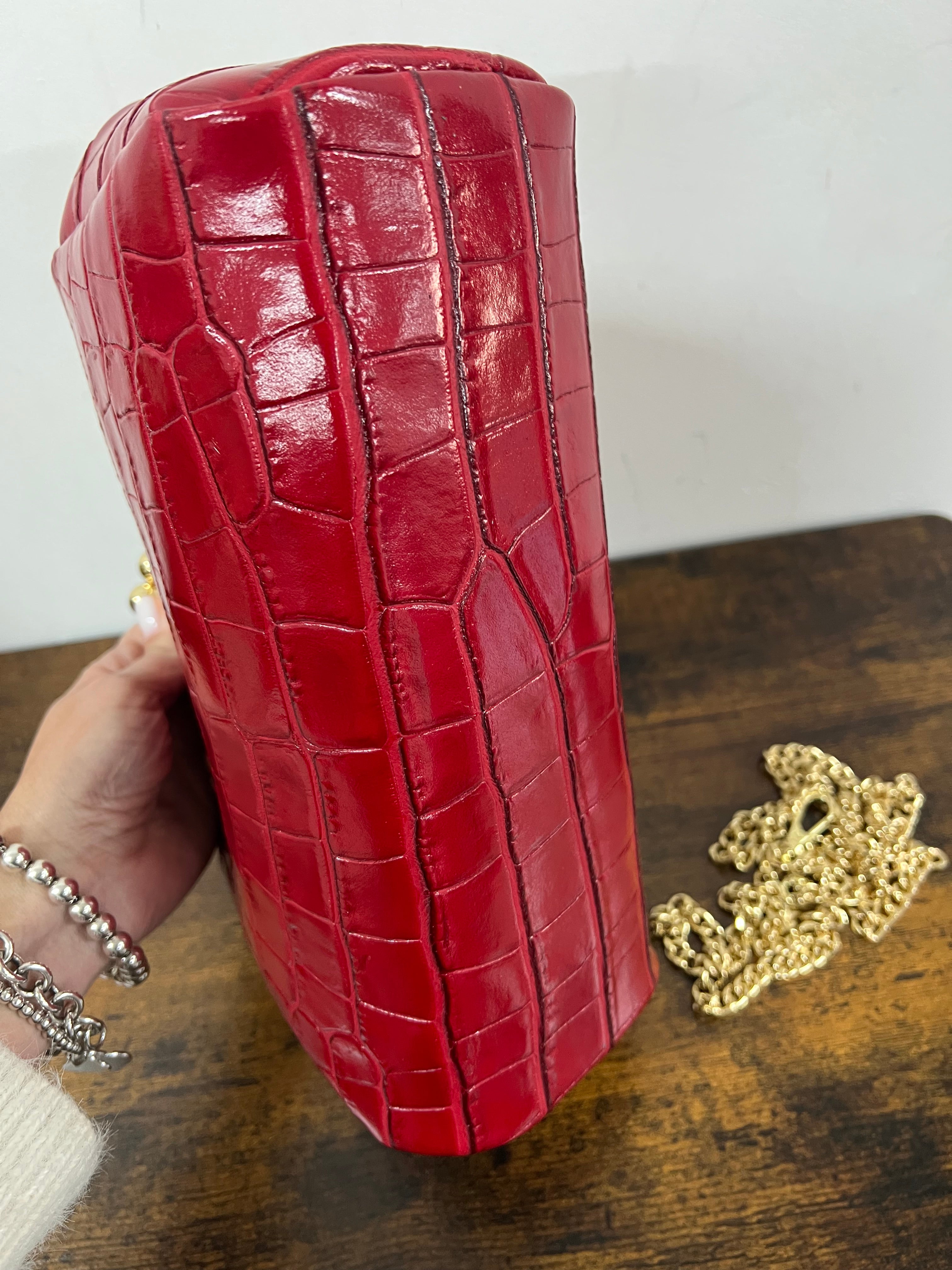 Large red patent crocodile print pouch