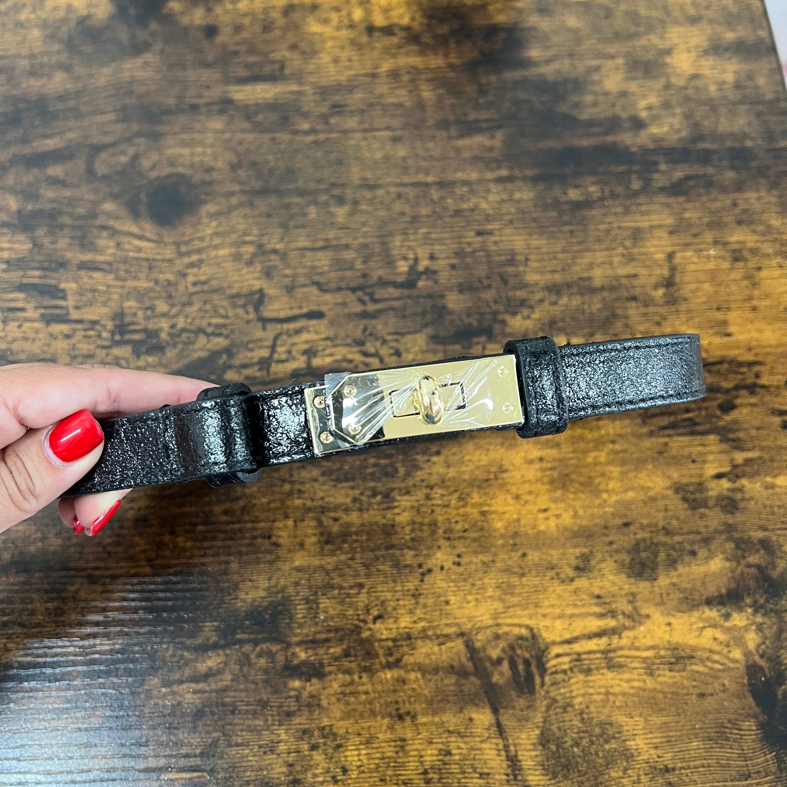 Cintura senza buchi nero laminato