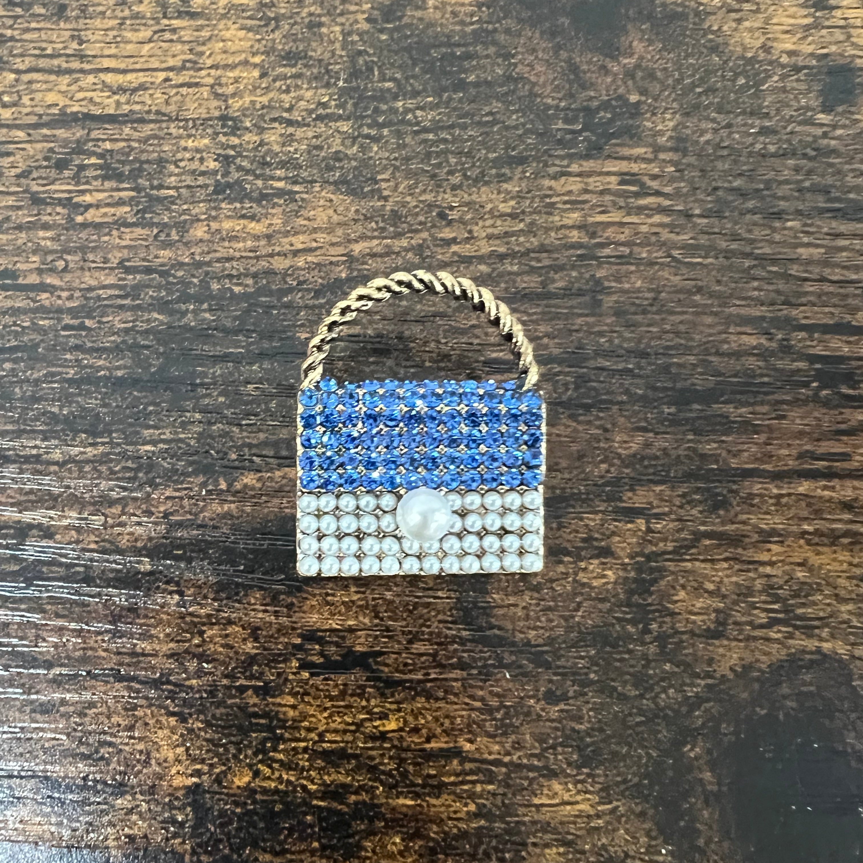 Spilla borsetta strass blu e bianco