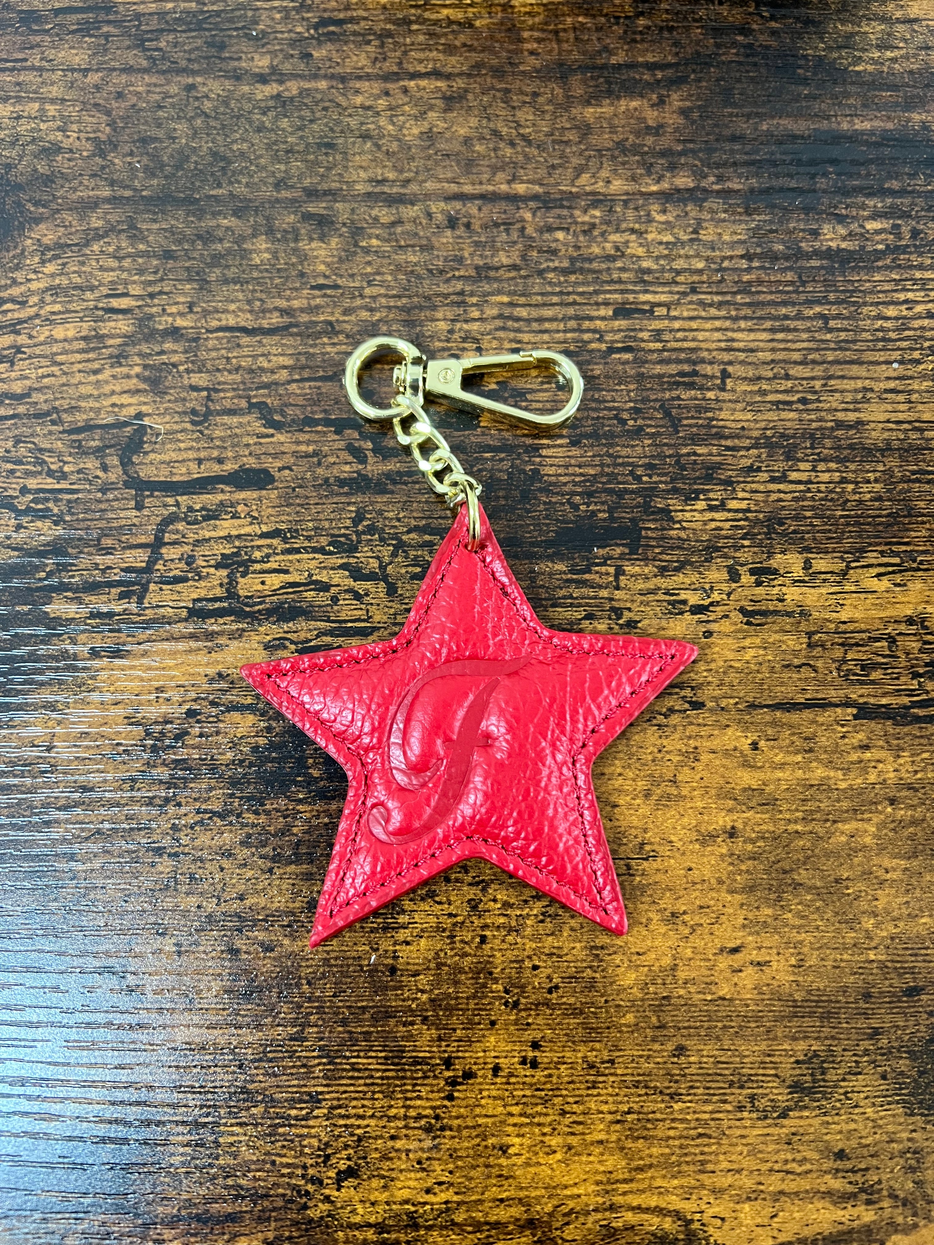 Stella in vera pelle rosso