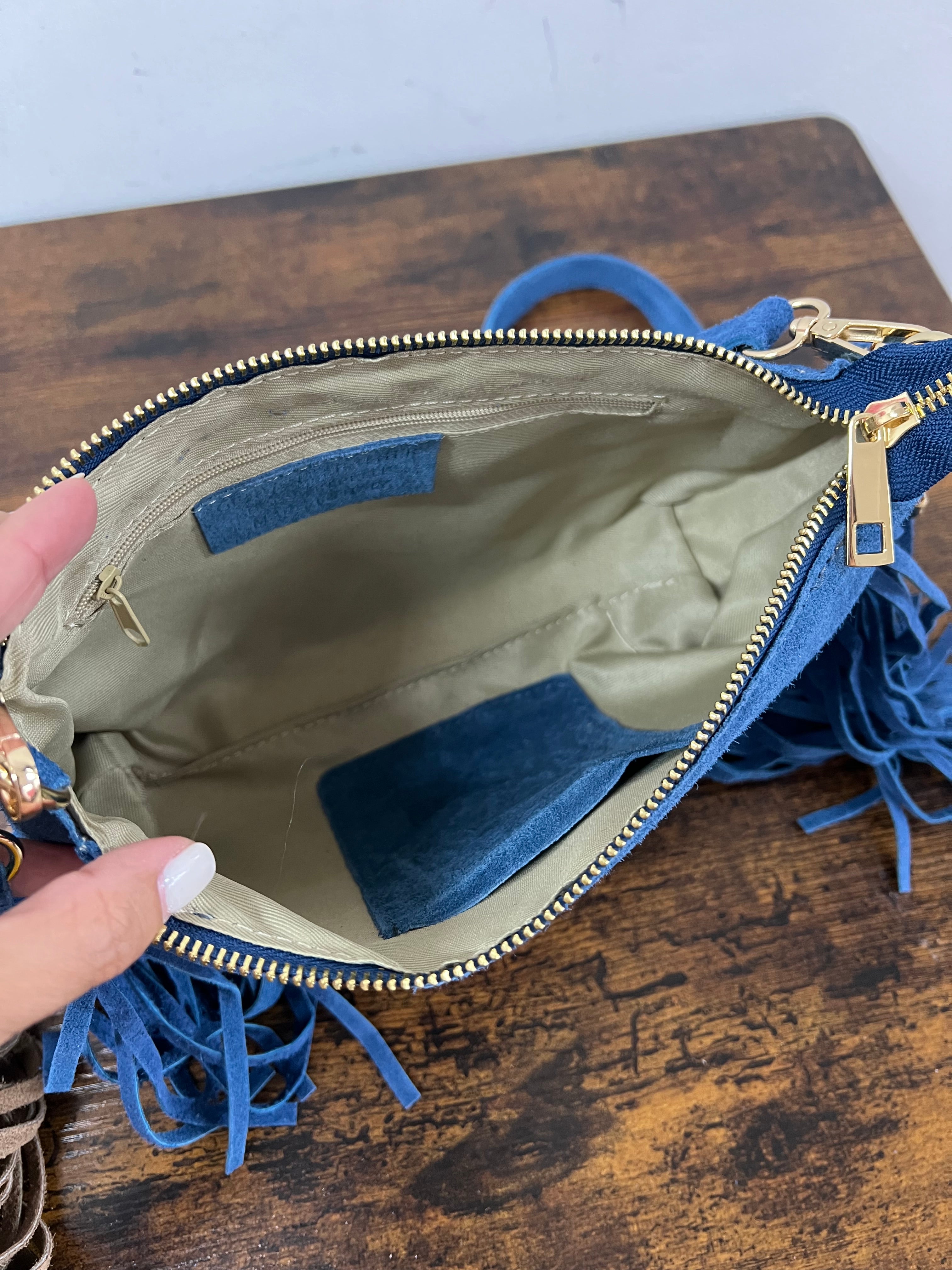 Powder blue suede fringed baguette bag