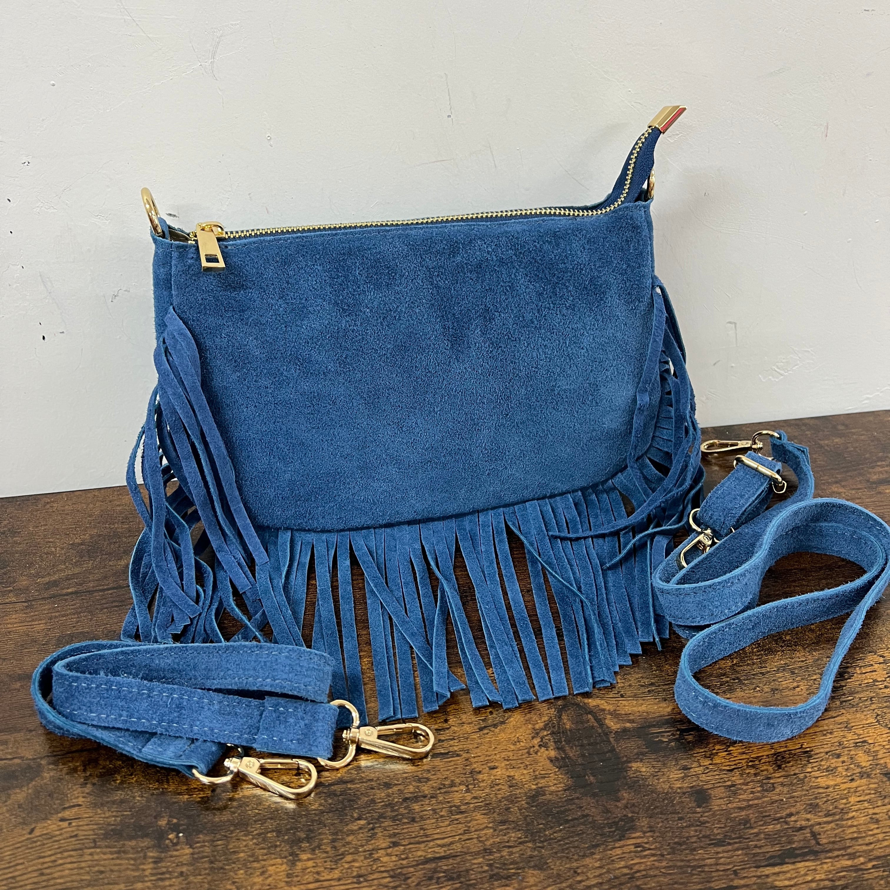 Powder blue suede fringed baguette bag