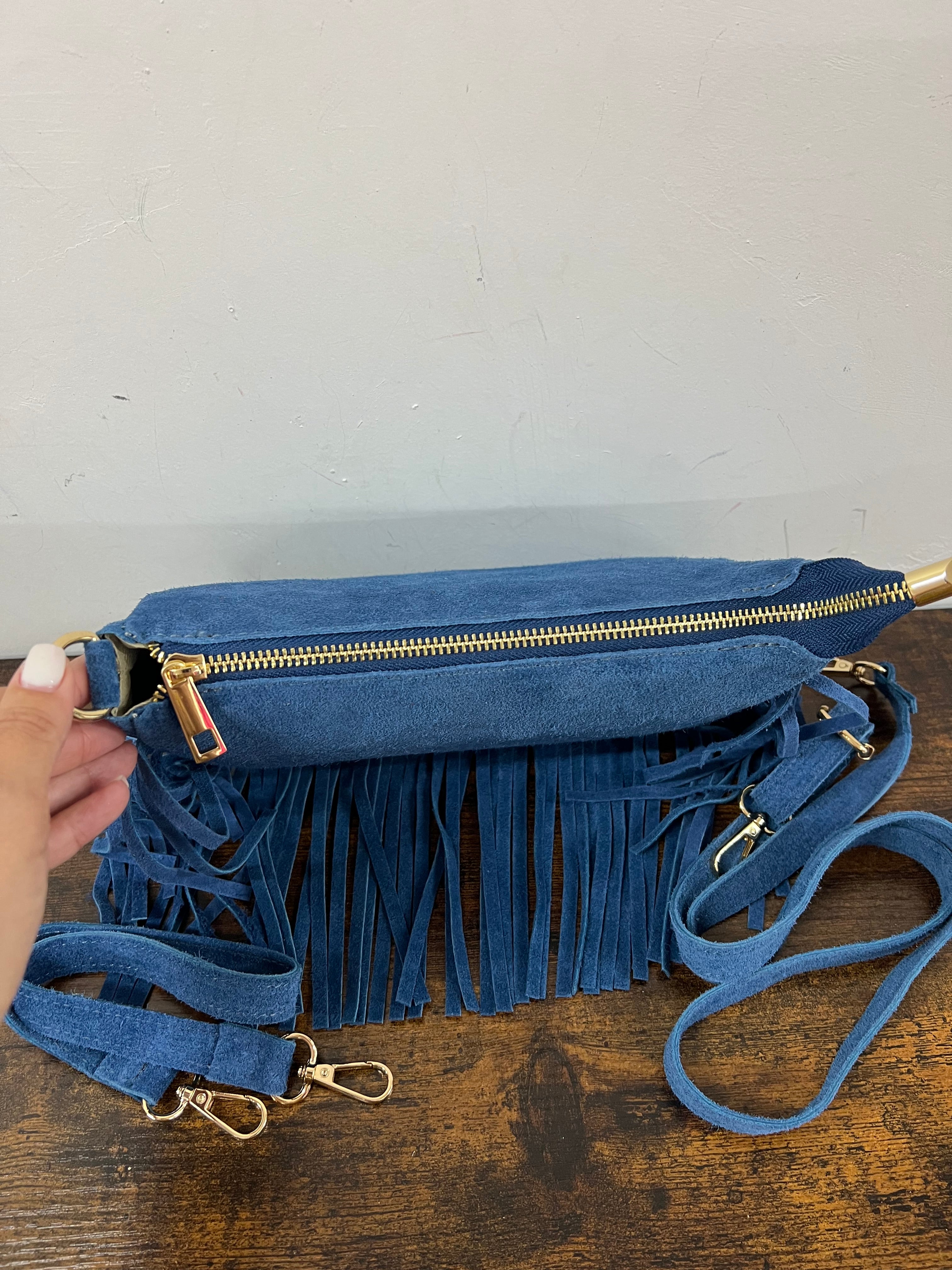 Powder blue suede fringed baguette bag