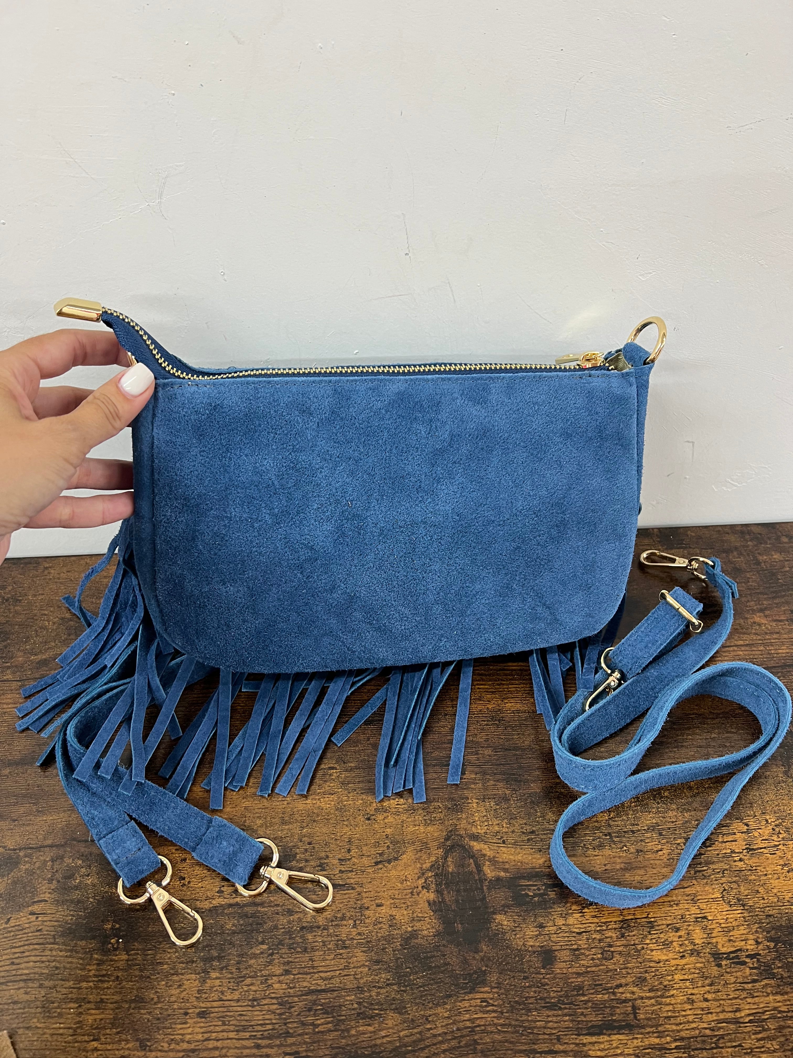 Powder blue suede fringed baguette bag