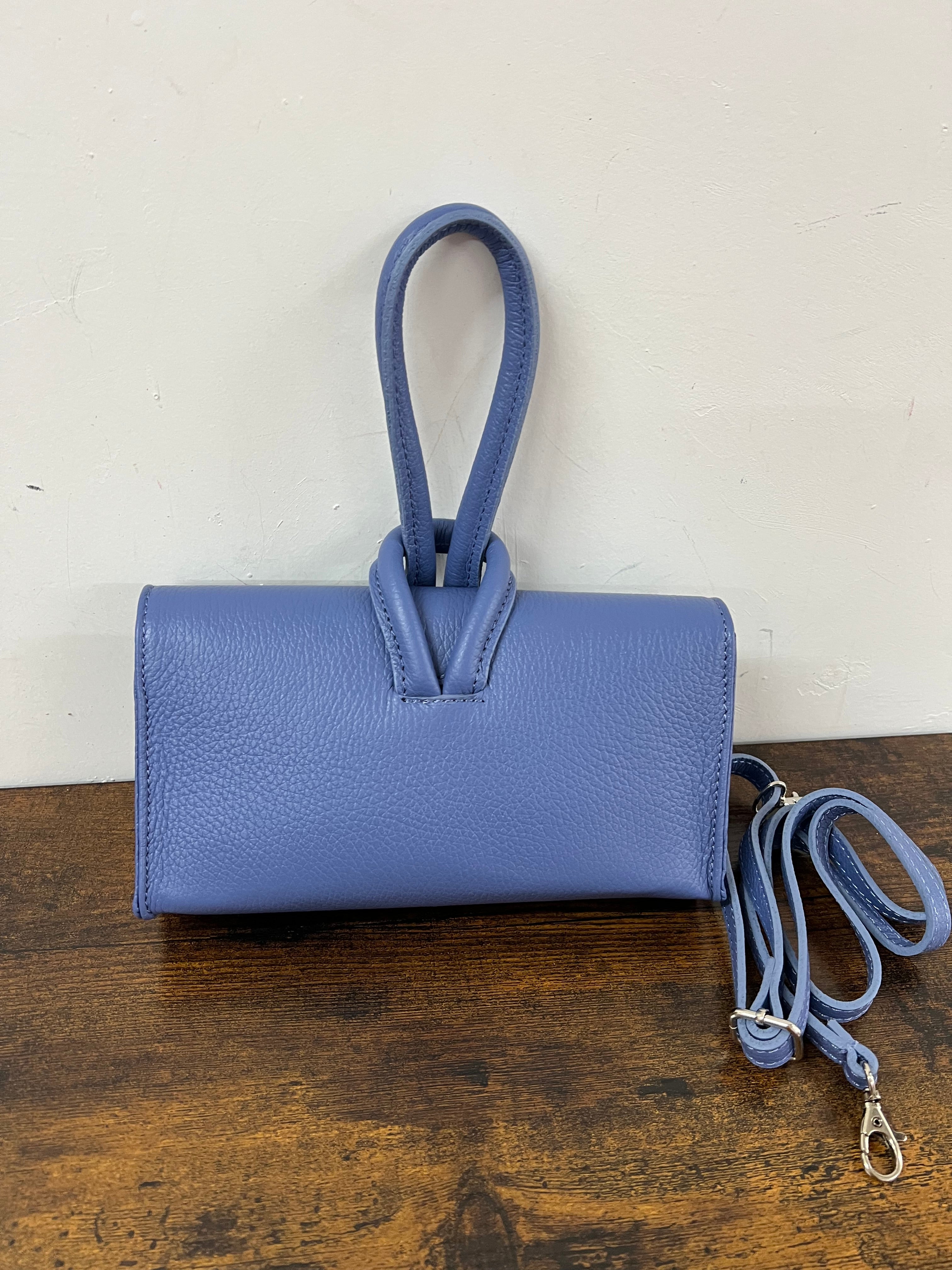 Limited edition indigo knot clutch