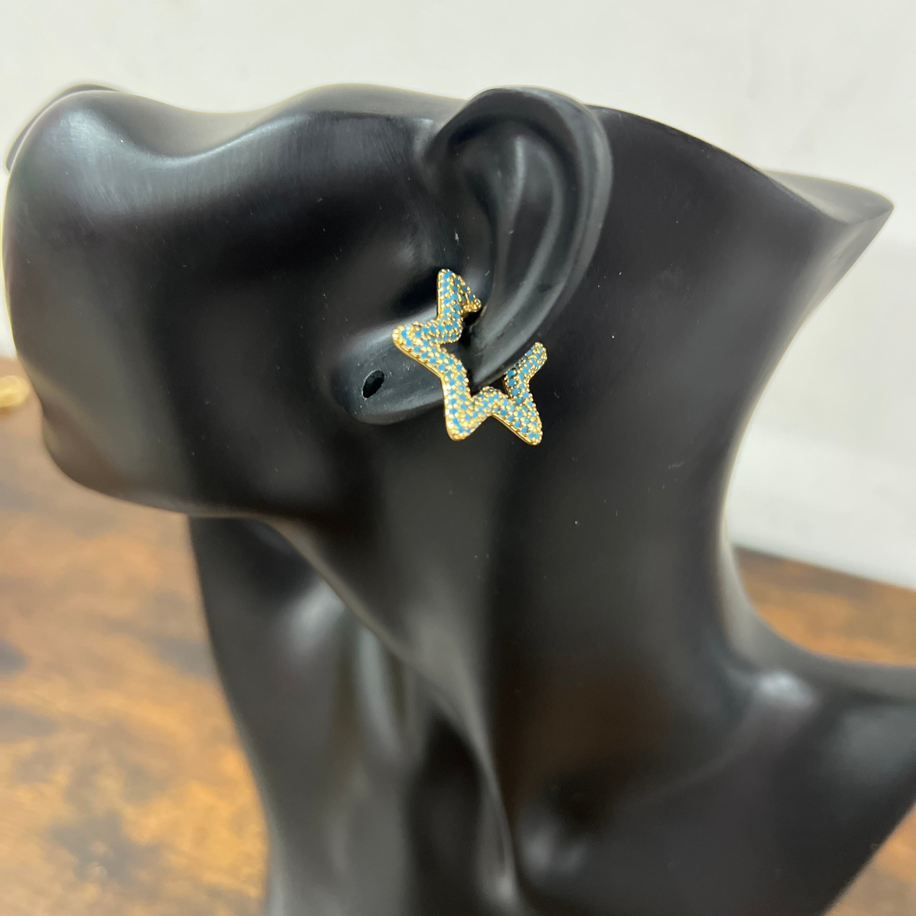Single earcuff stella dorata zirconi turchesi