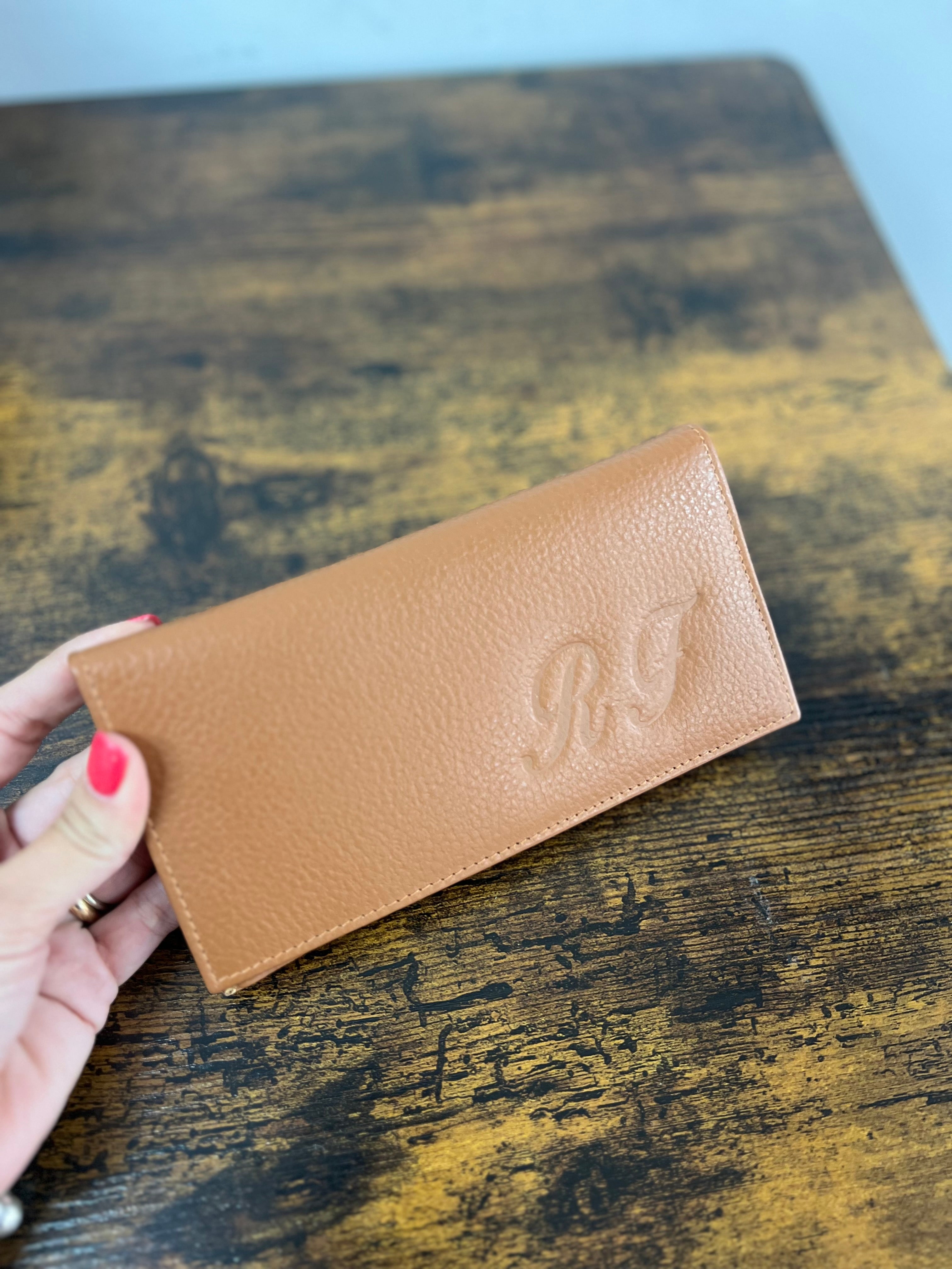Big open dark leather card holder