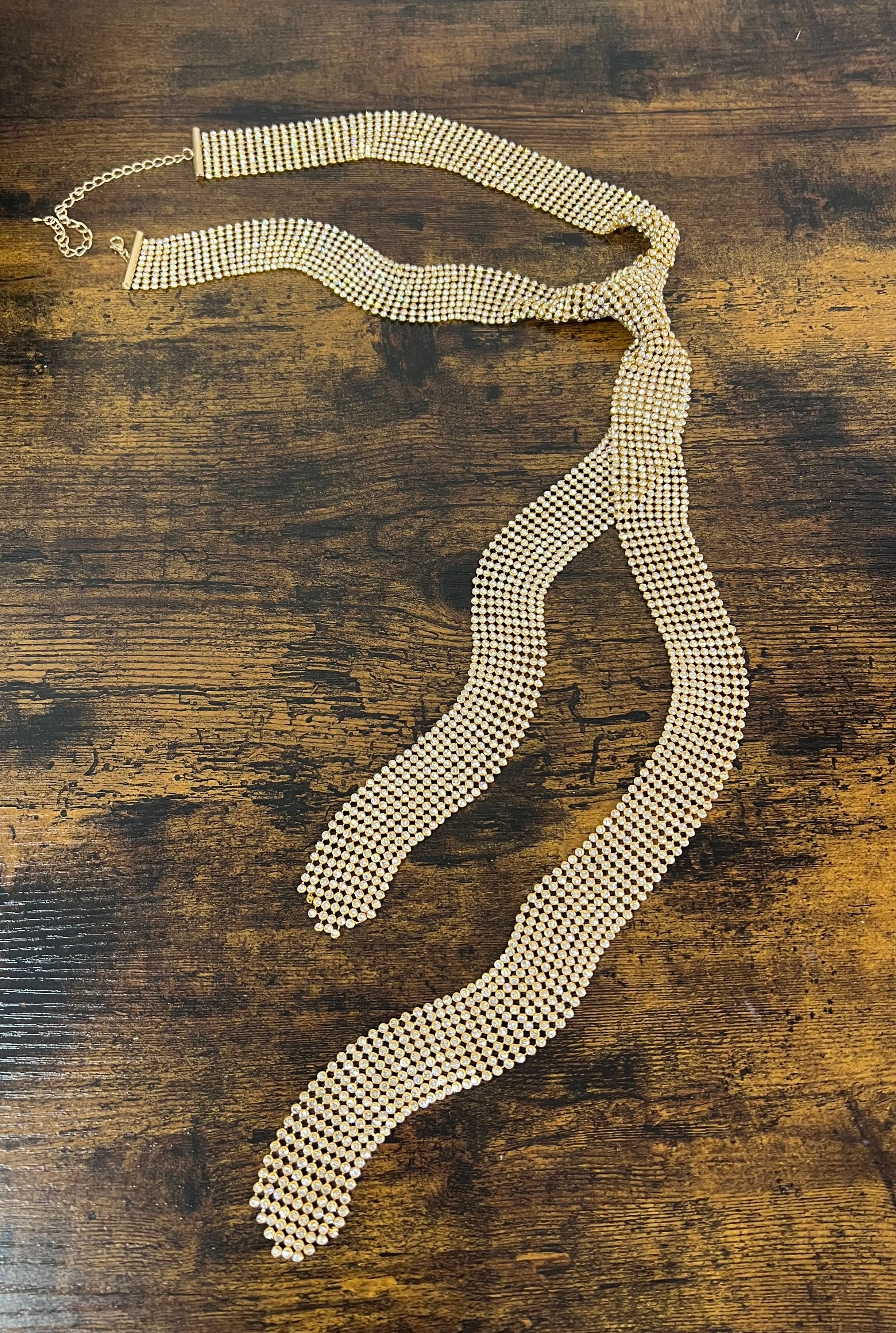 Cravatta strass bianco base dorata