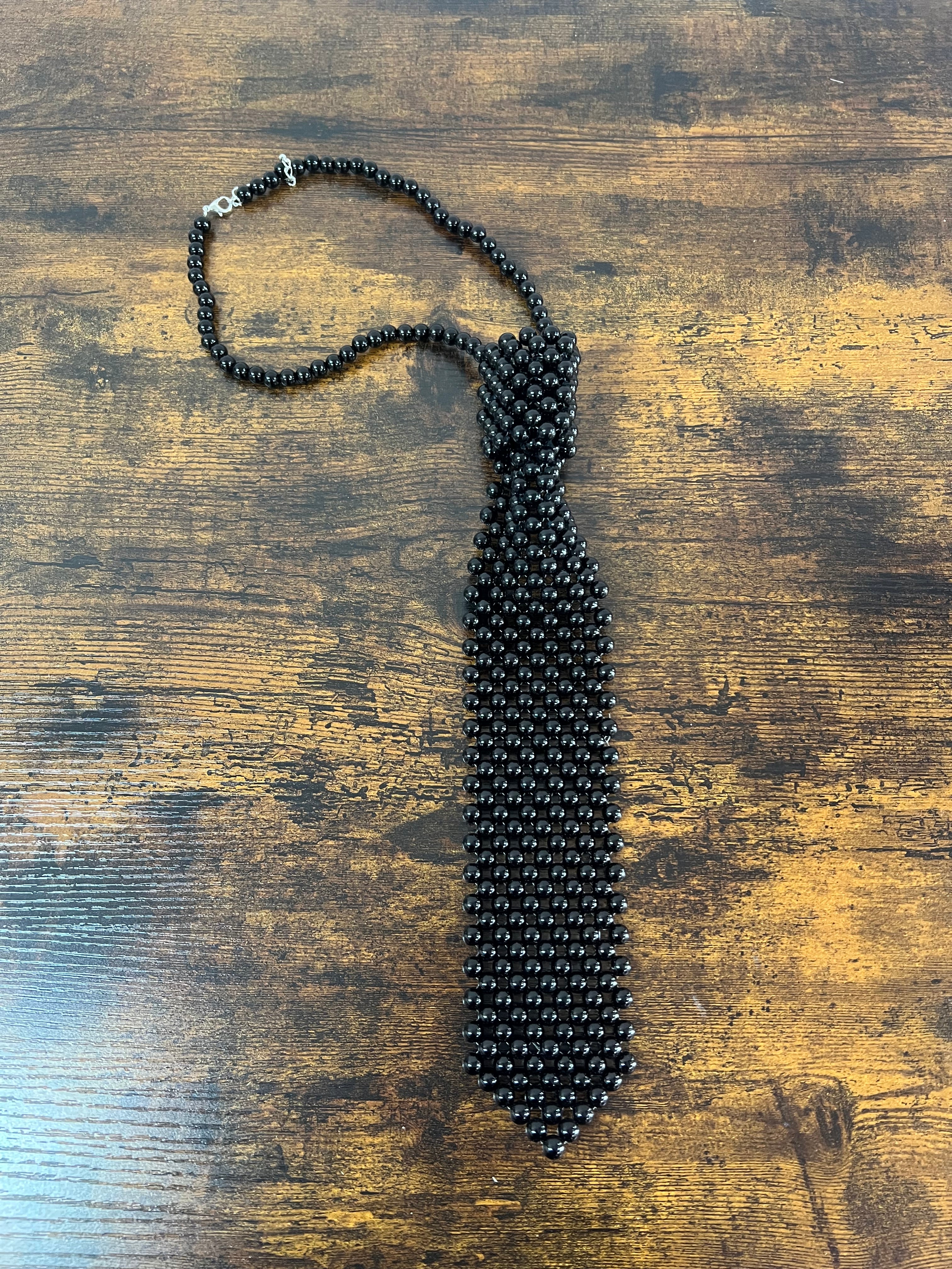 Cravatta perle nere