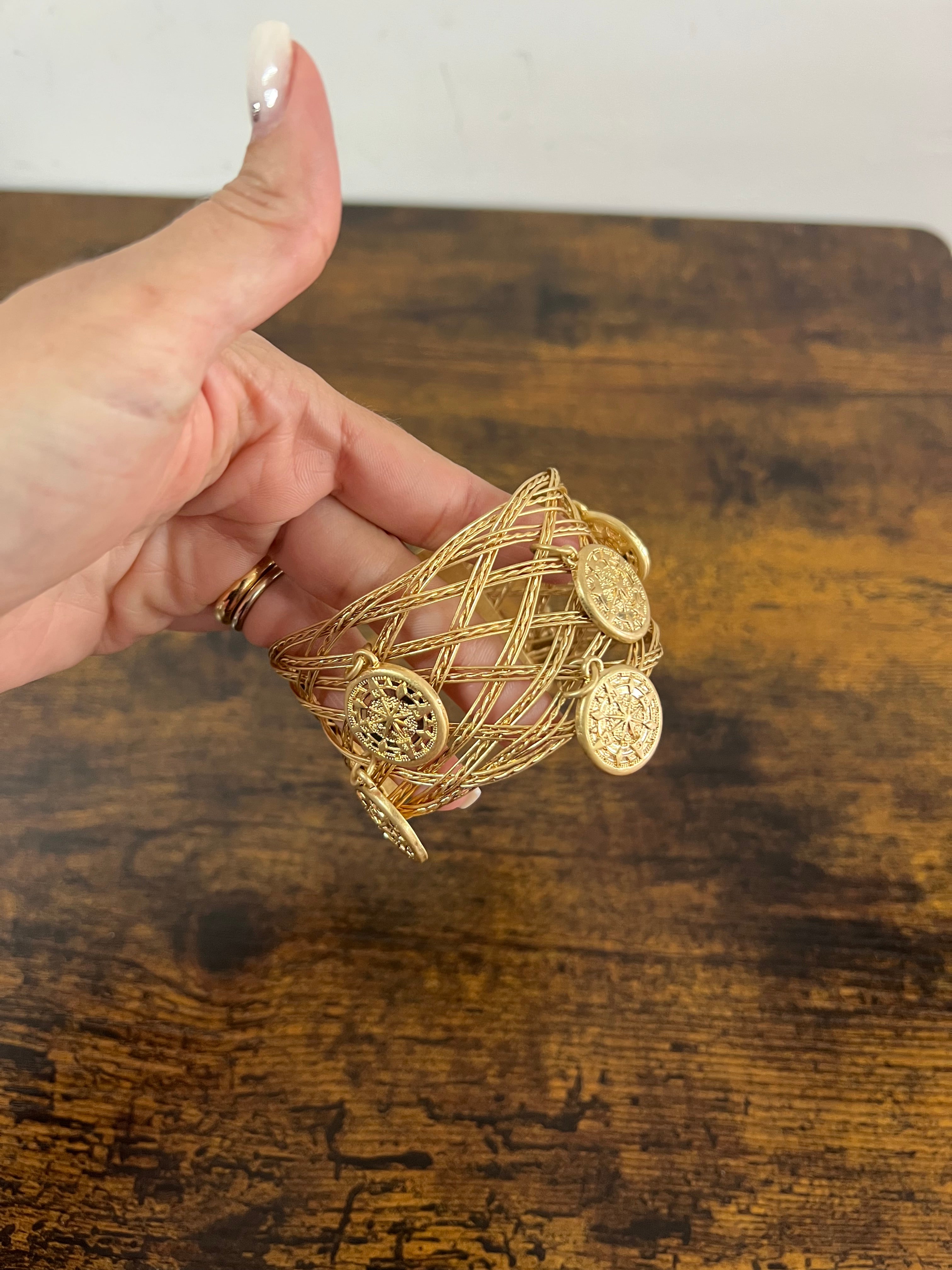 Bracciale rigido monete dorato