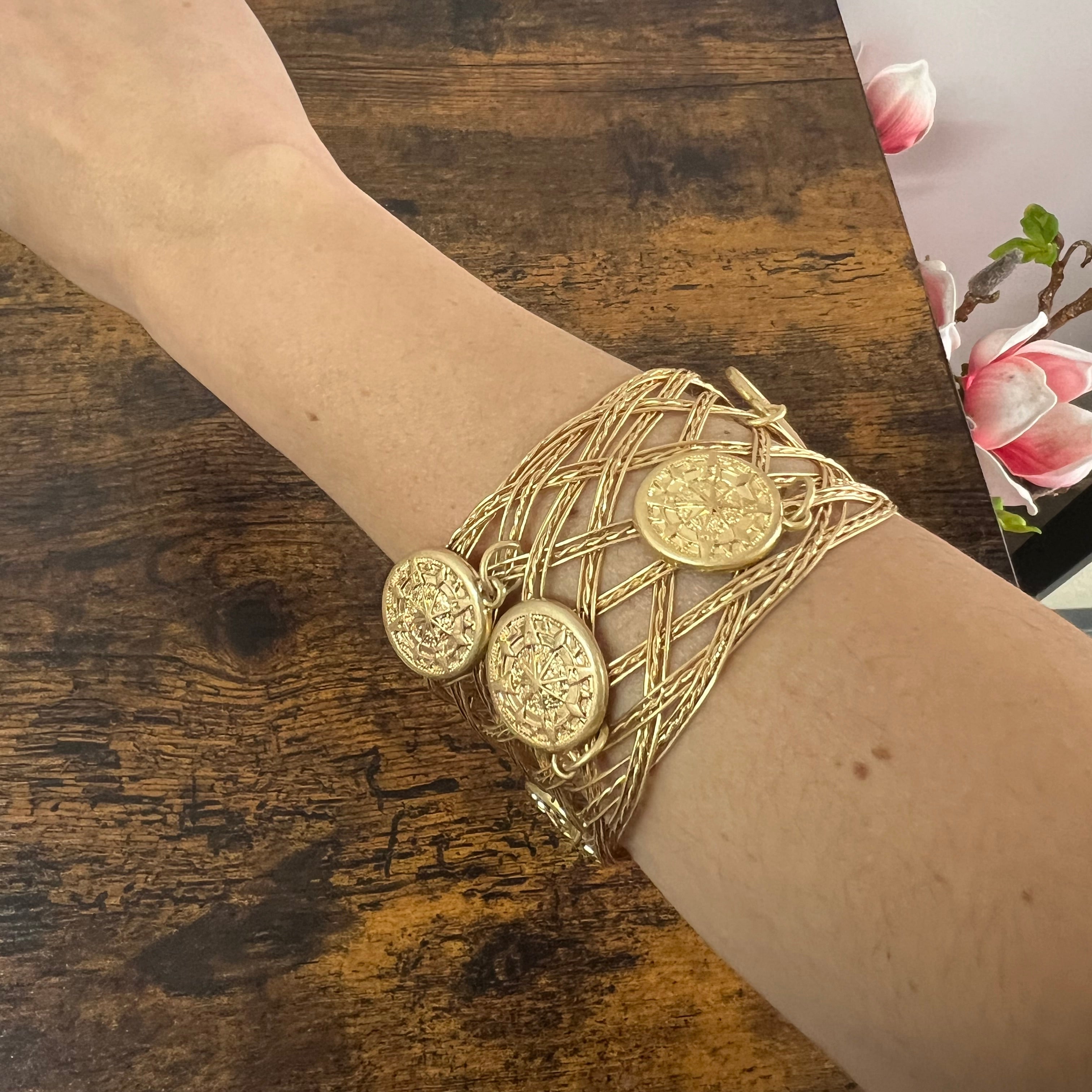 Bracciale rigido monete dorato