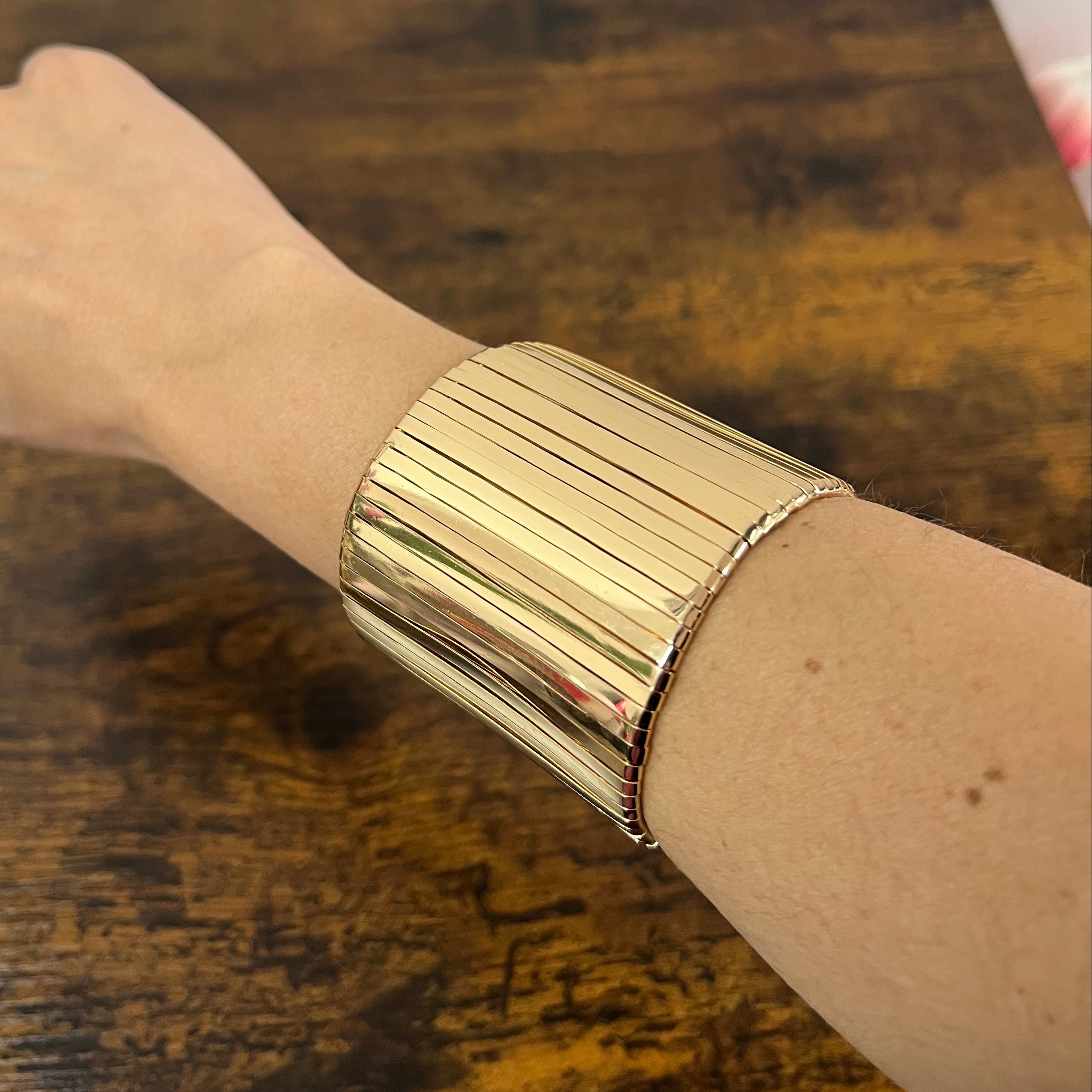 Bracciale rigido mille righe dorato