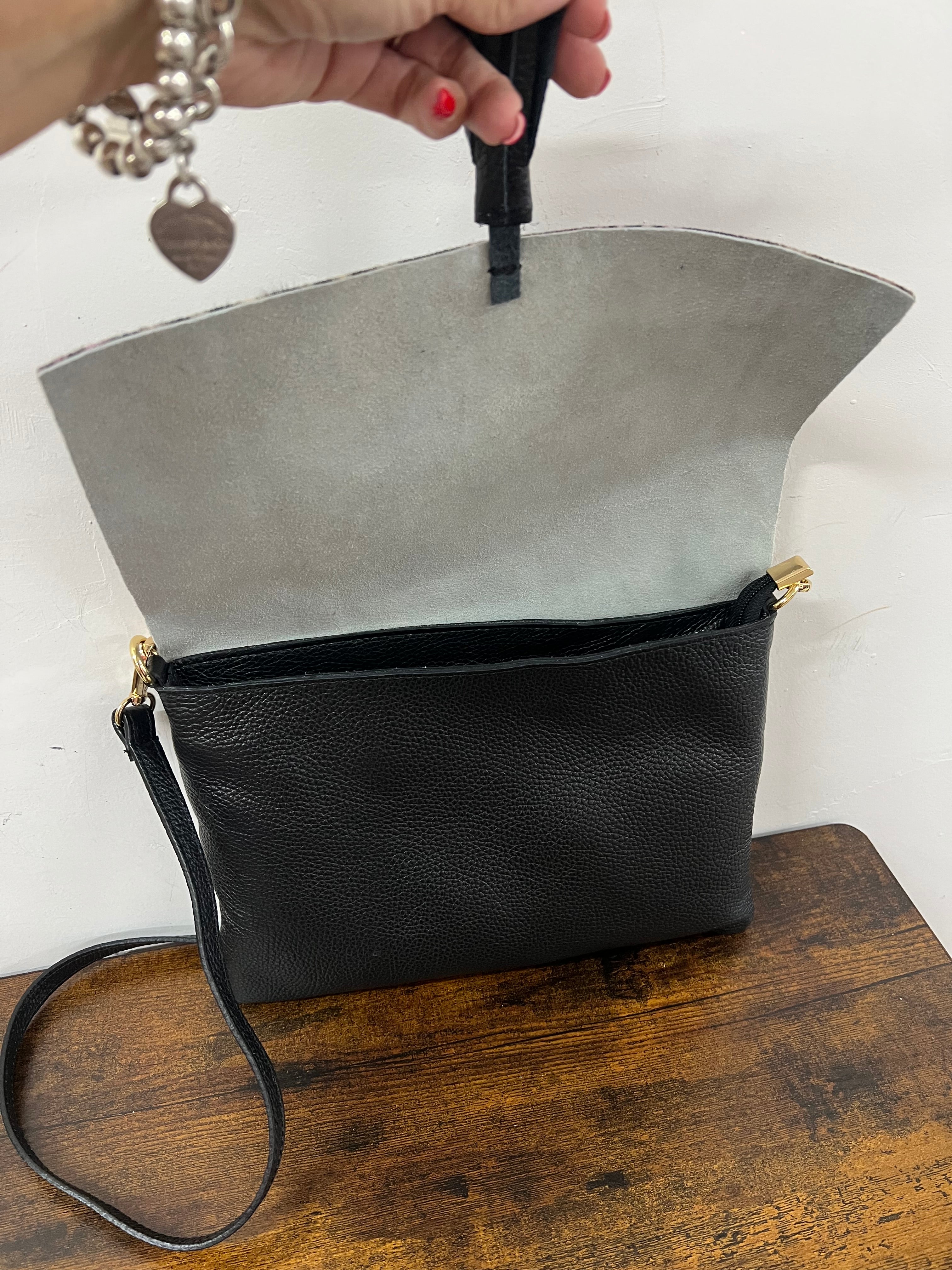 Pochette cavallino striato marrone pink