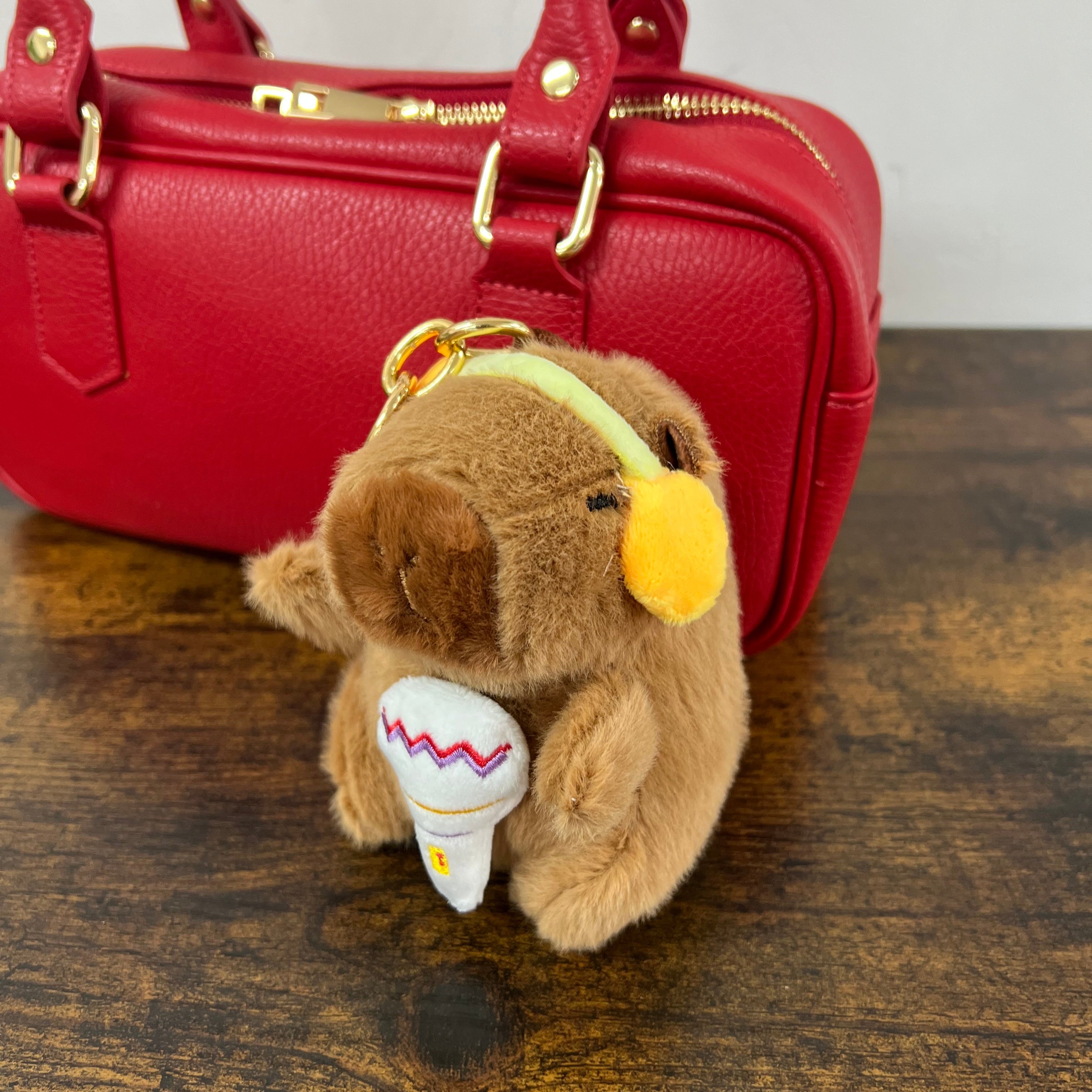 Capibara peluche cuffia gialla