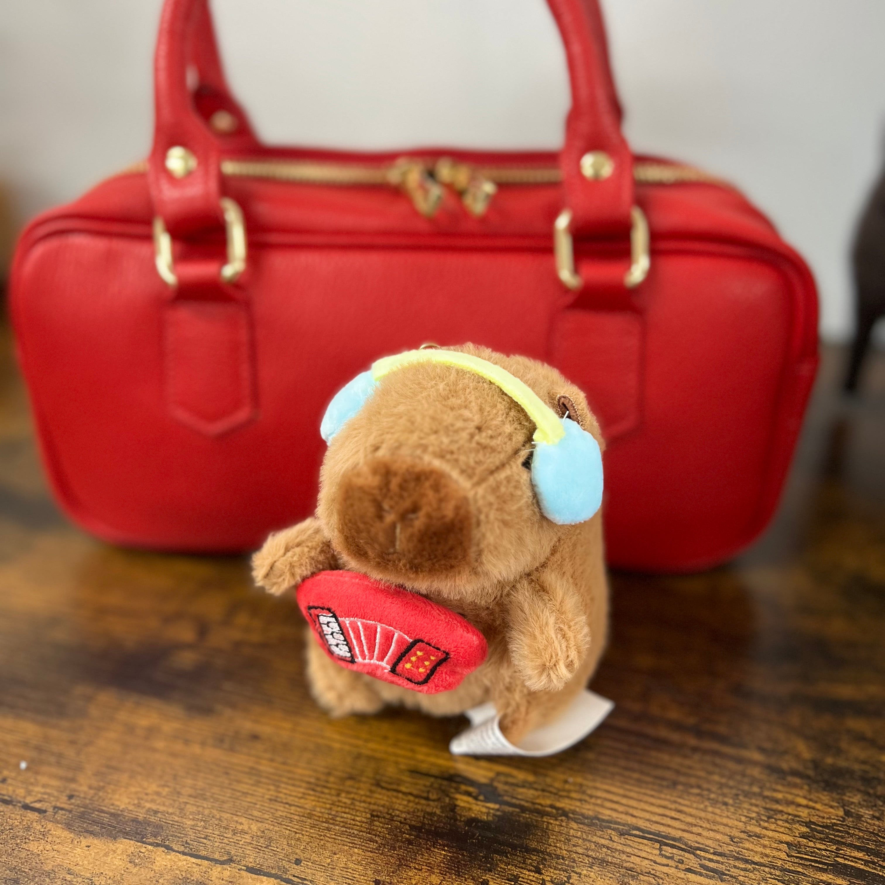 Capibara peluche cuffia celeste