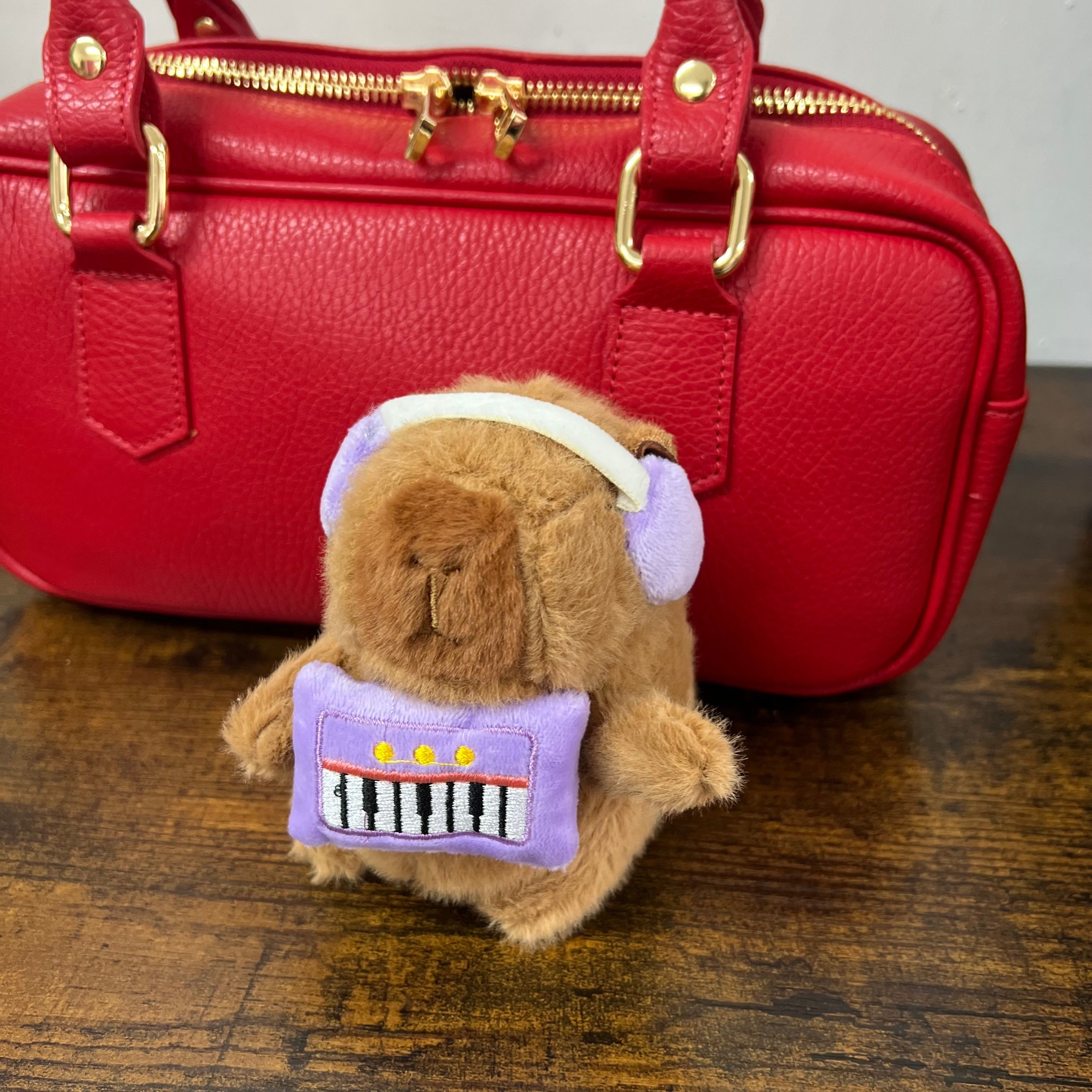 Capibara peluche cuffia lilla
