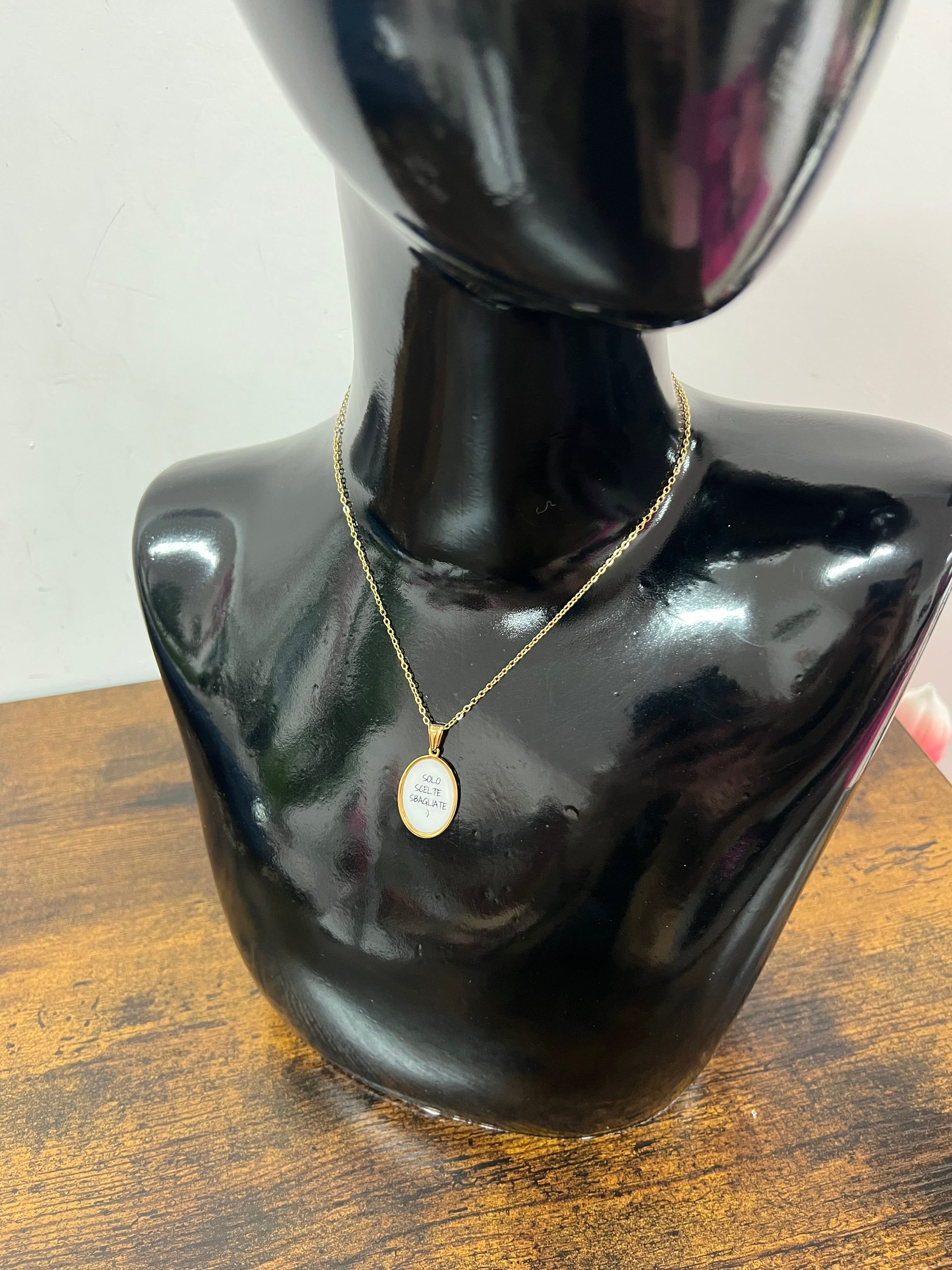 Necklace with a pendant that says "only bad choices"