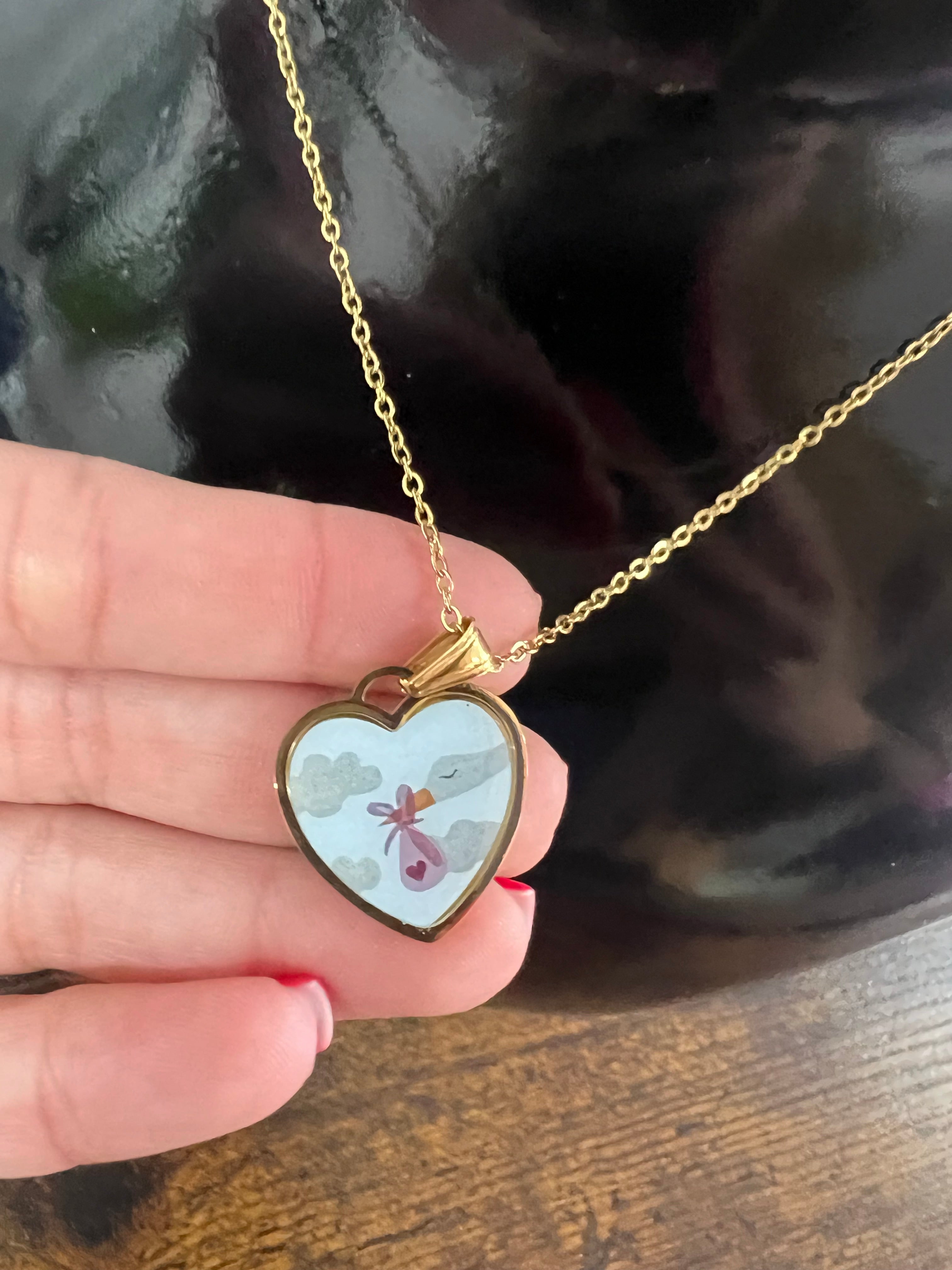 Stork medallion necklace