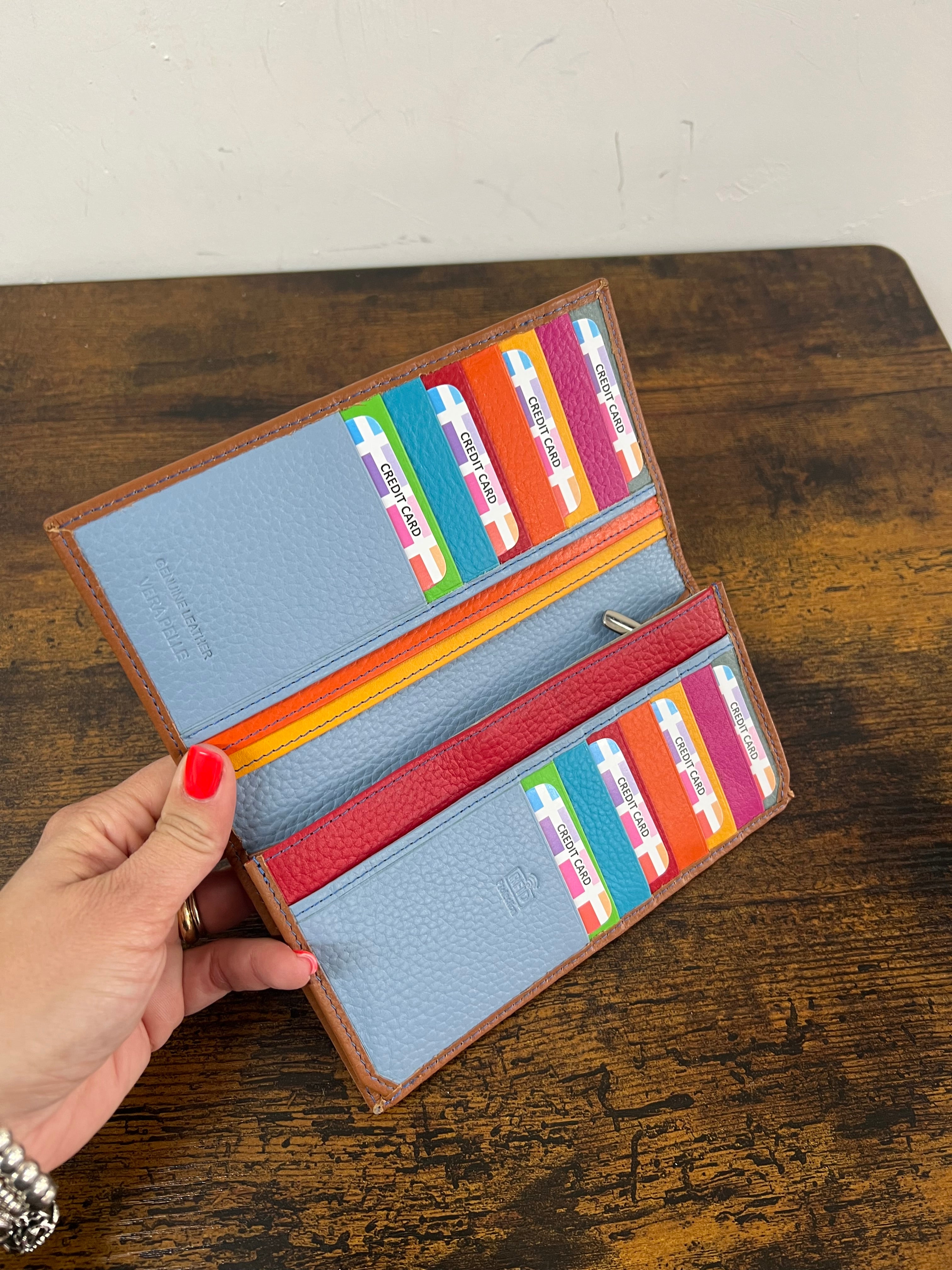 Big open dark leather card holder