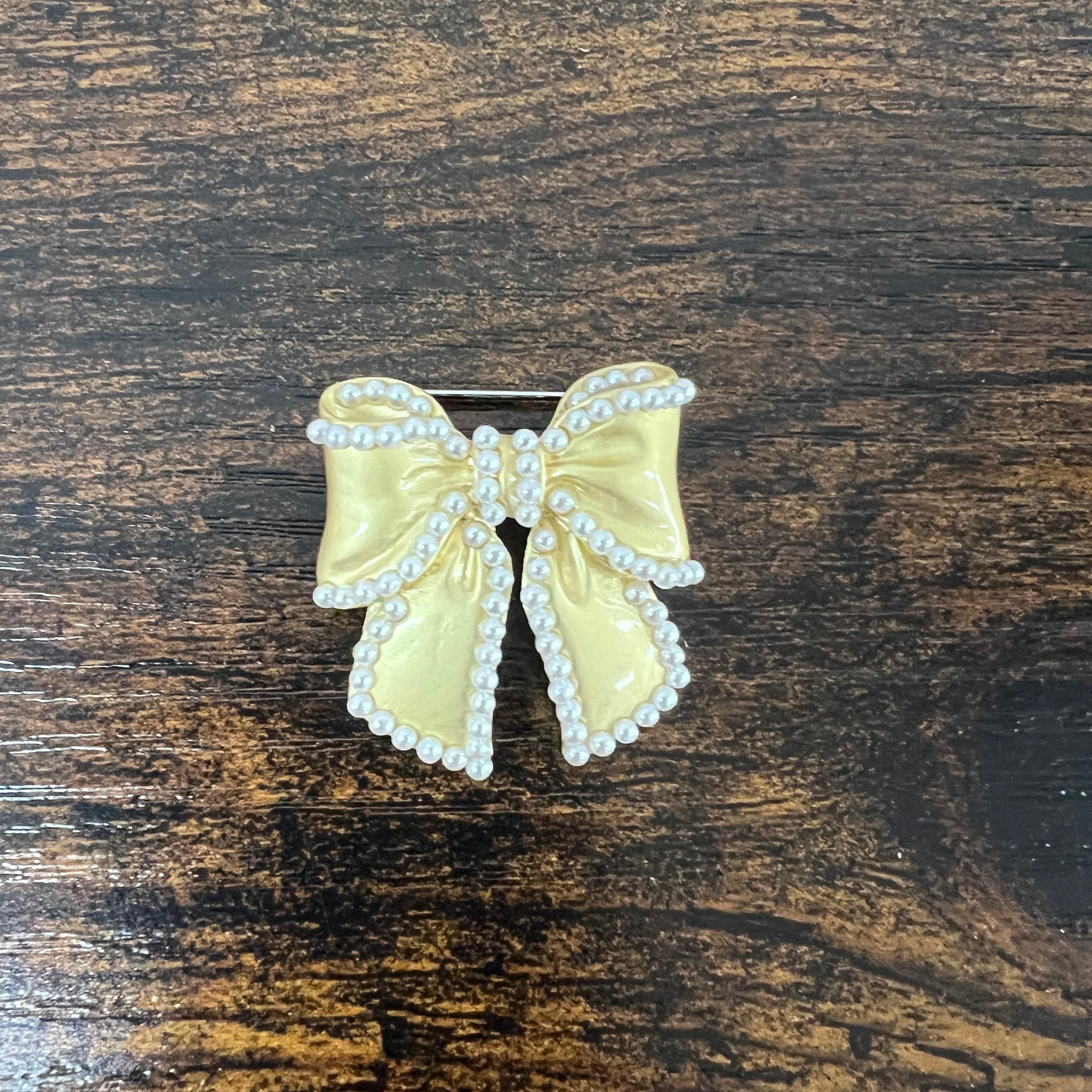 Spilla fiocco dorata