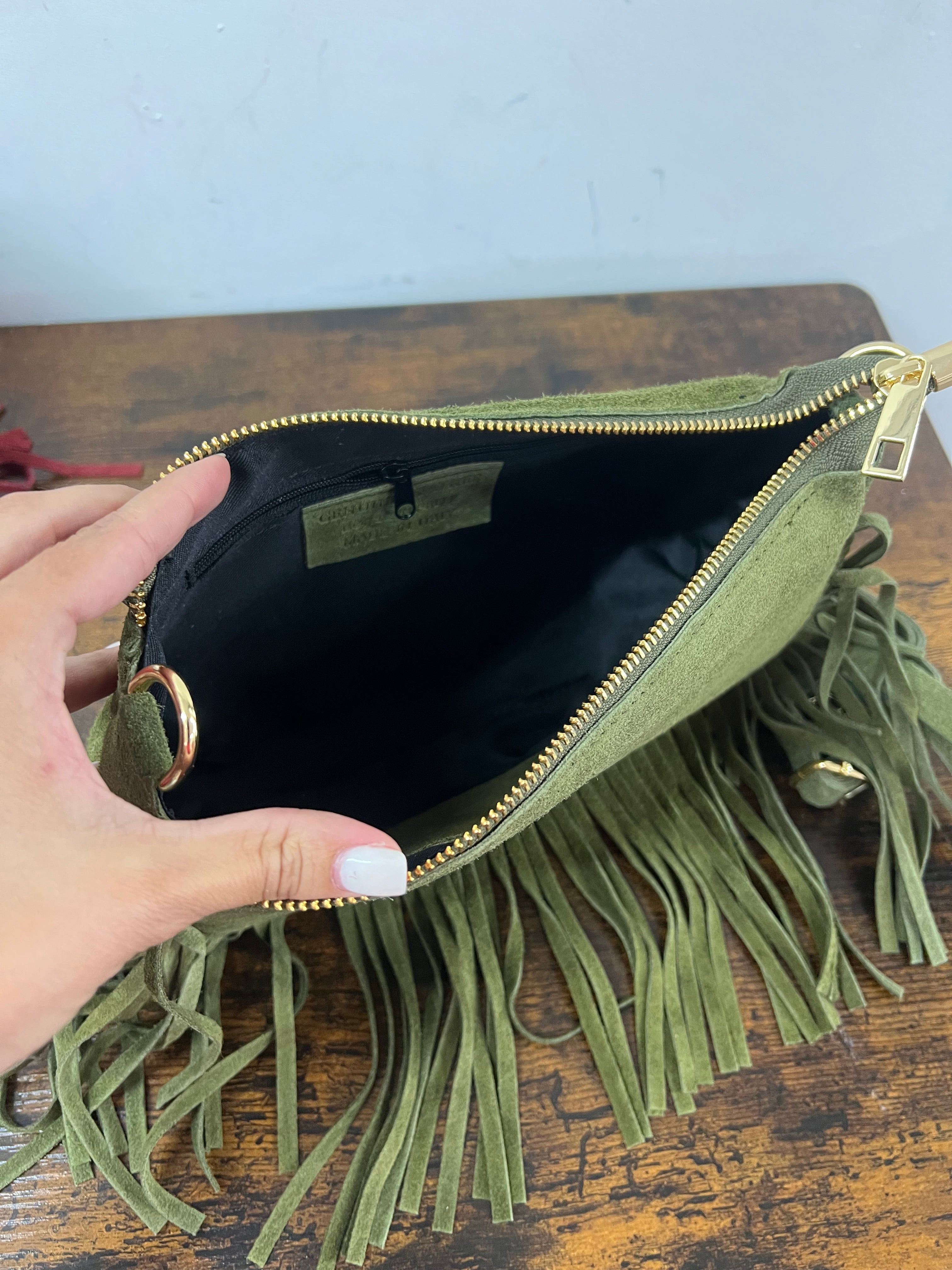 Military green suede fringed baguette bag