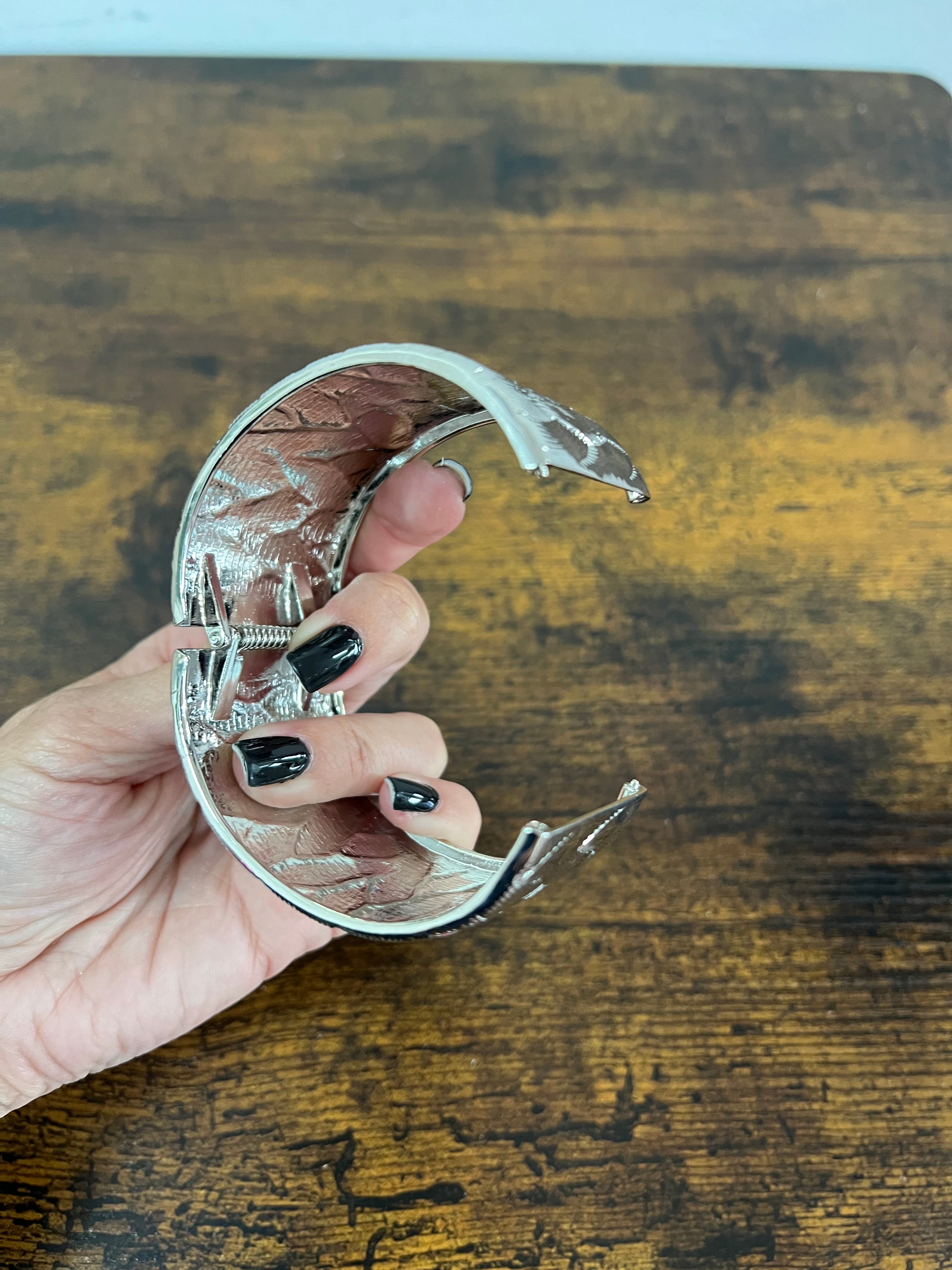 Bracciale rigido maxi intreccio argentato