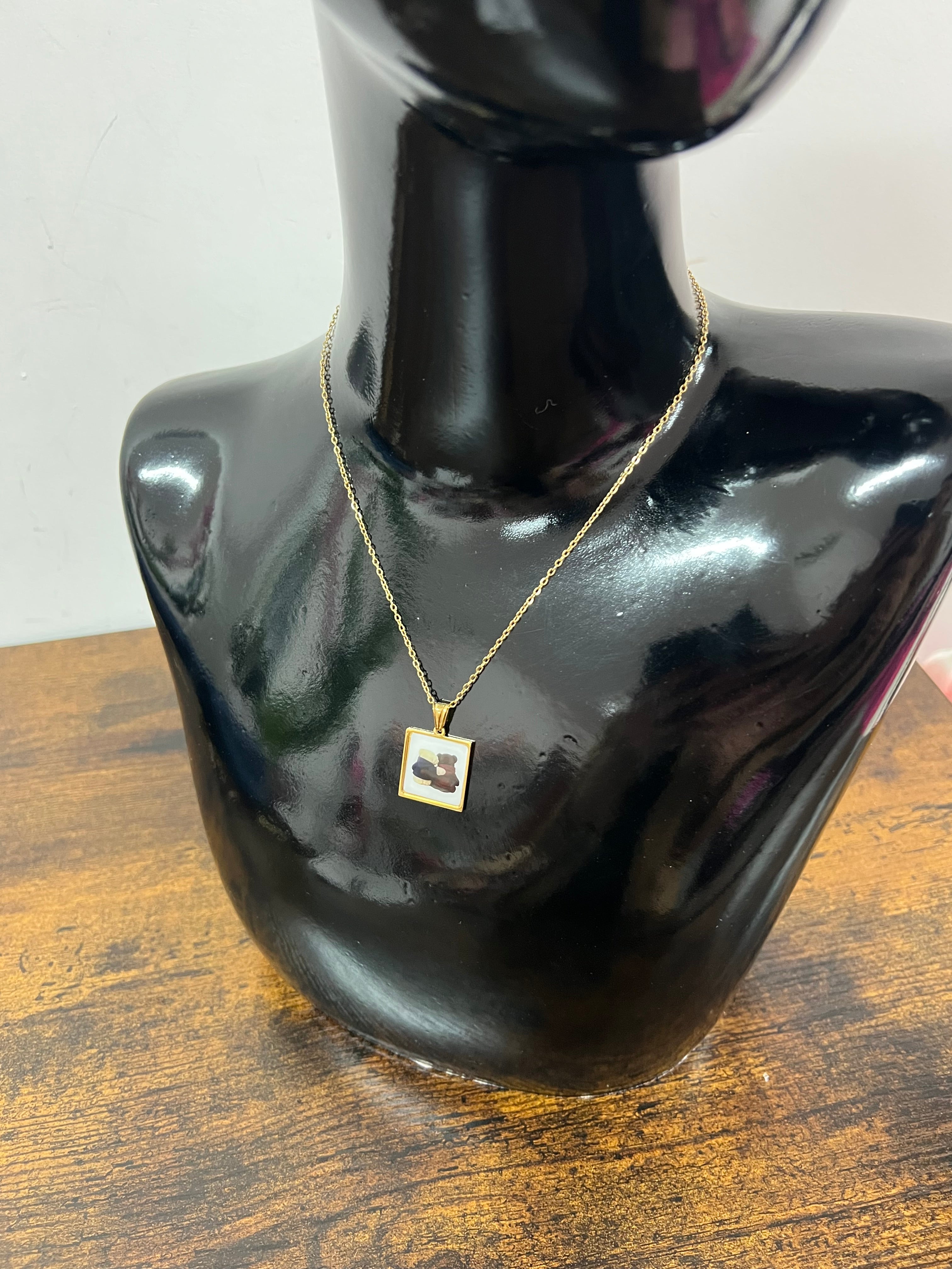 Necklace with bear hug charm