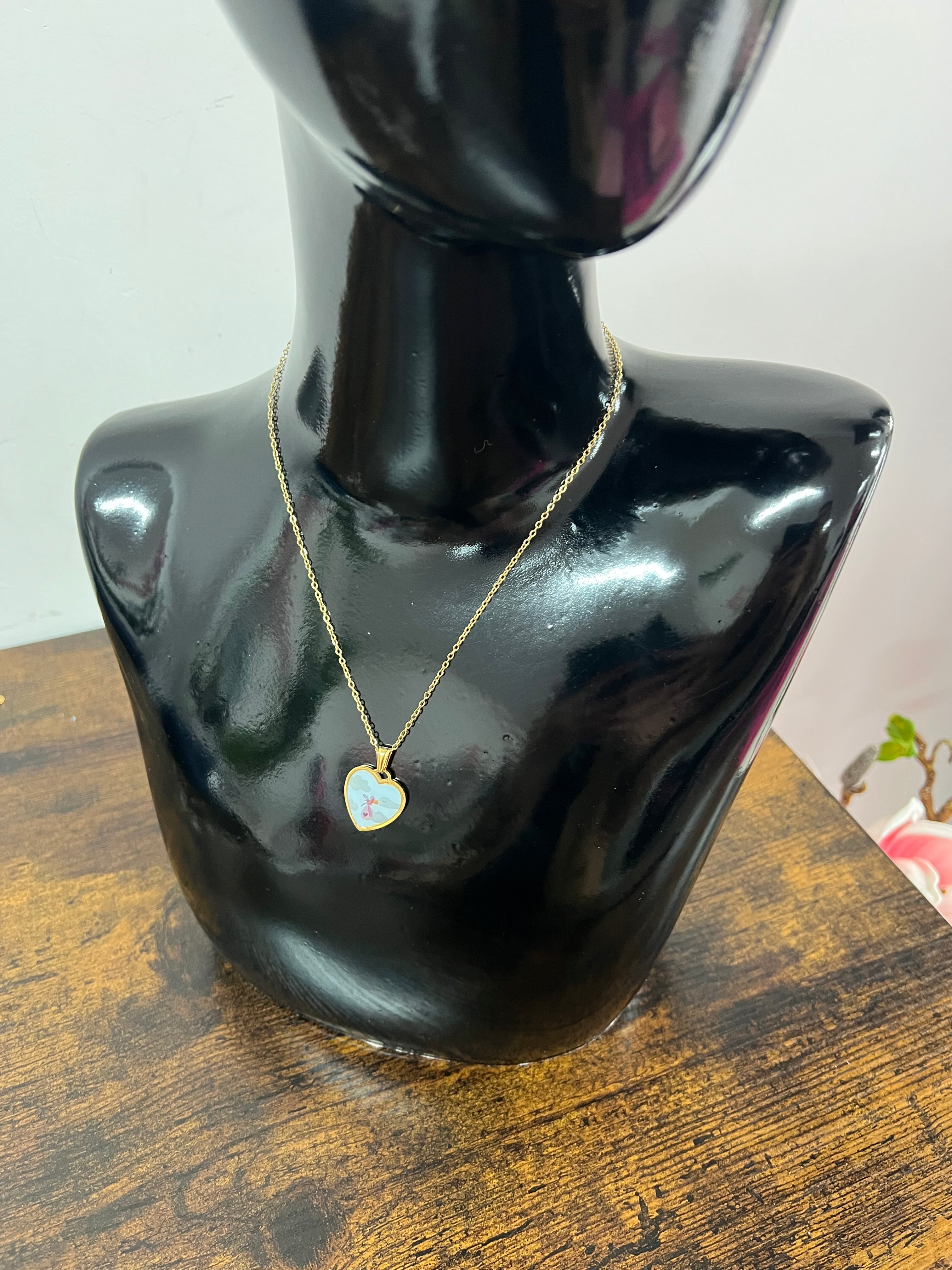 Stork medallion necklace