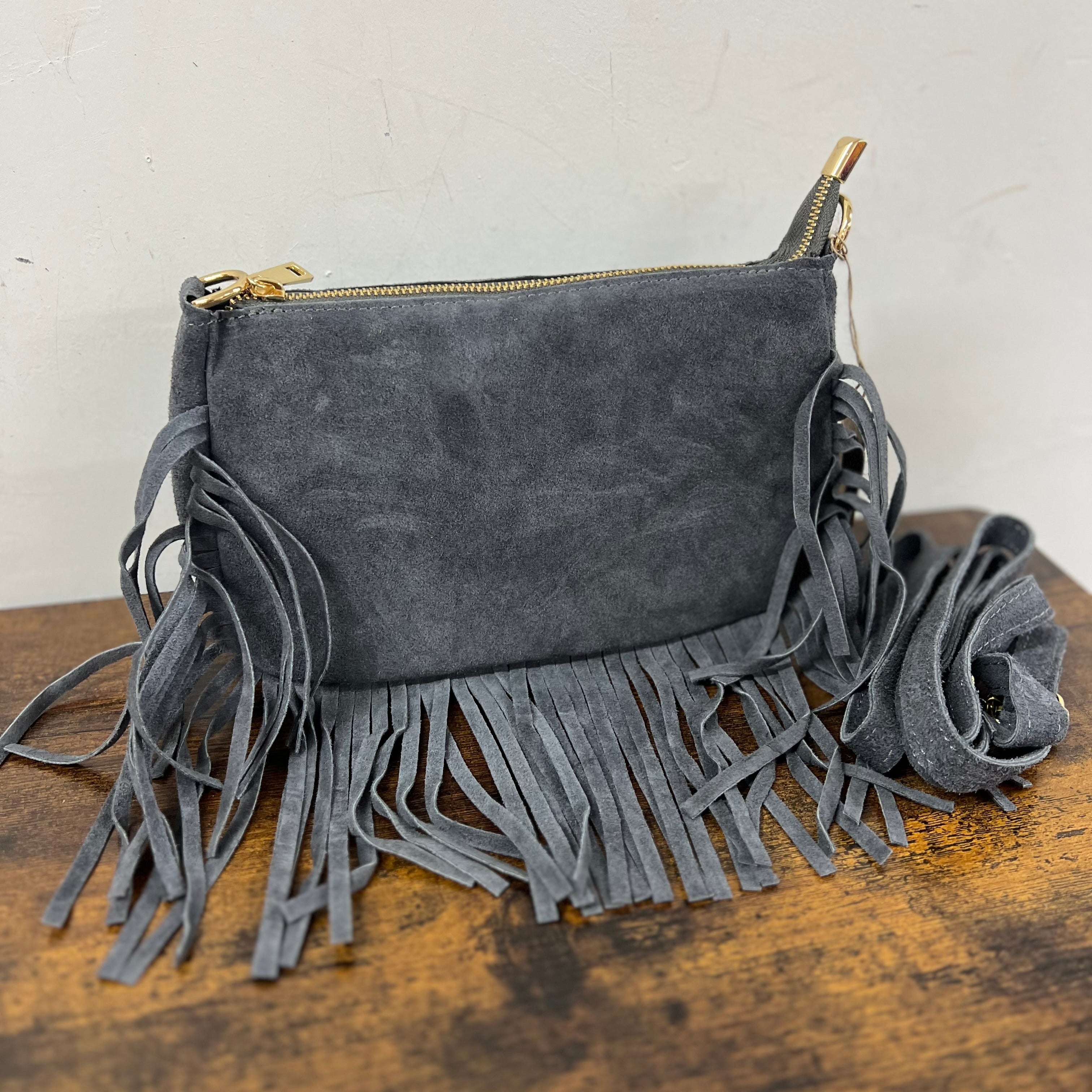 Dark grey suede fringe baguette