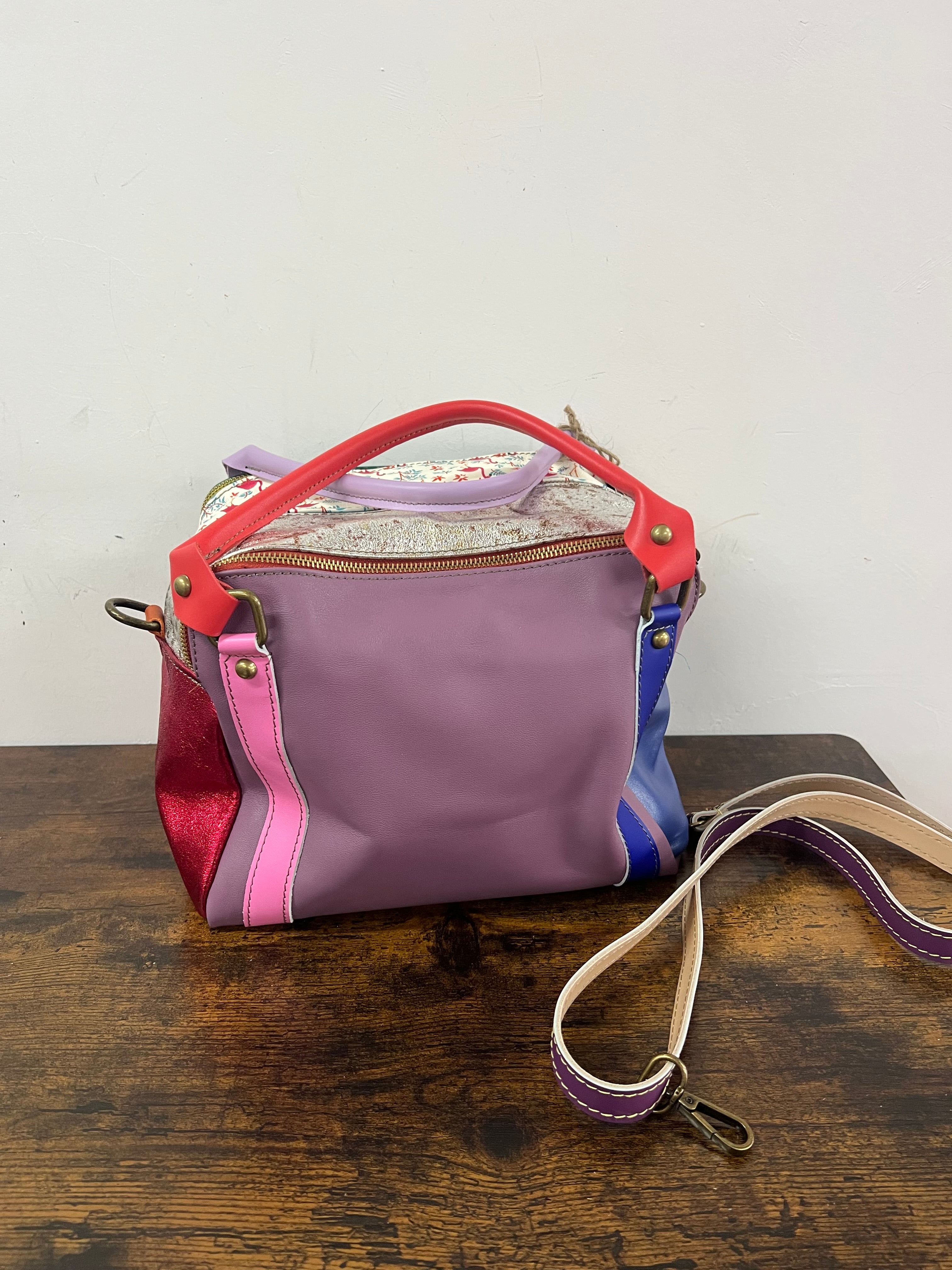 Square country-style patchwork in fiery red and pale purple