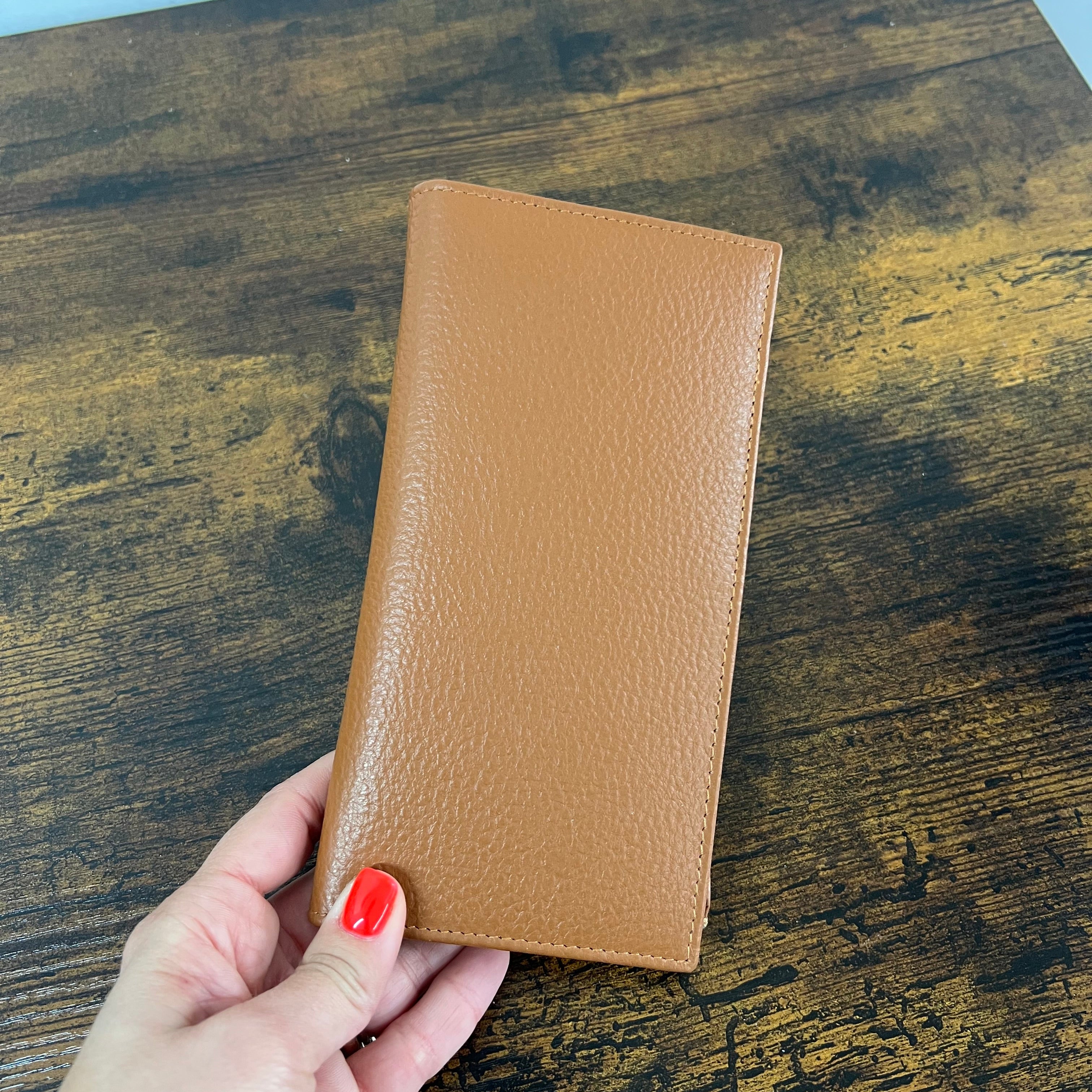 Big open dark leather card holder